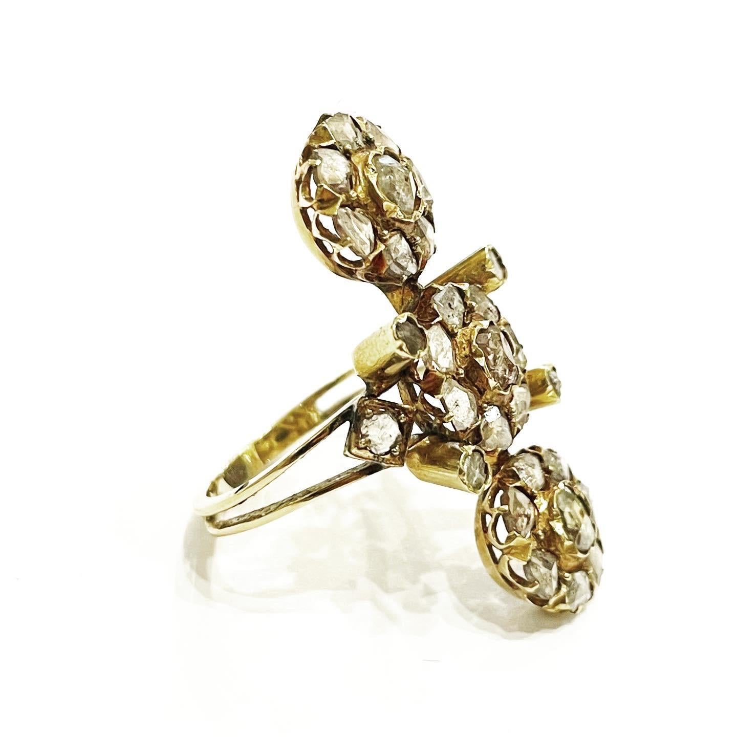 19th century Victorian yellow gold, rose cut diamonds cocktail ring.
Metal: 18 karat yellow gold.
Probably Spain. Condition:Good.
Rose cut diamonds. 
Total approximate diamond carat weight:: 2.5 carats.
Height:  3.4 cm Width: 1.8 cm. Weight: 5.46