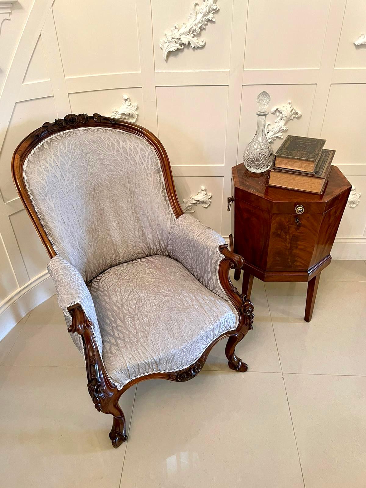 Quality 19th century Victorian antique mahogany carved library chair having a glorious quality shaped carved mahogany back depicting pretty flowers, divine scrolled arms finely carved with the most appealing flowers to the knees. This terrific