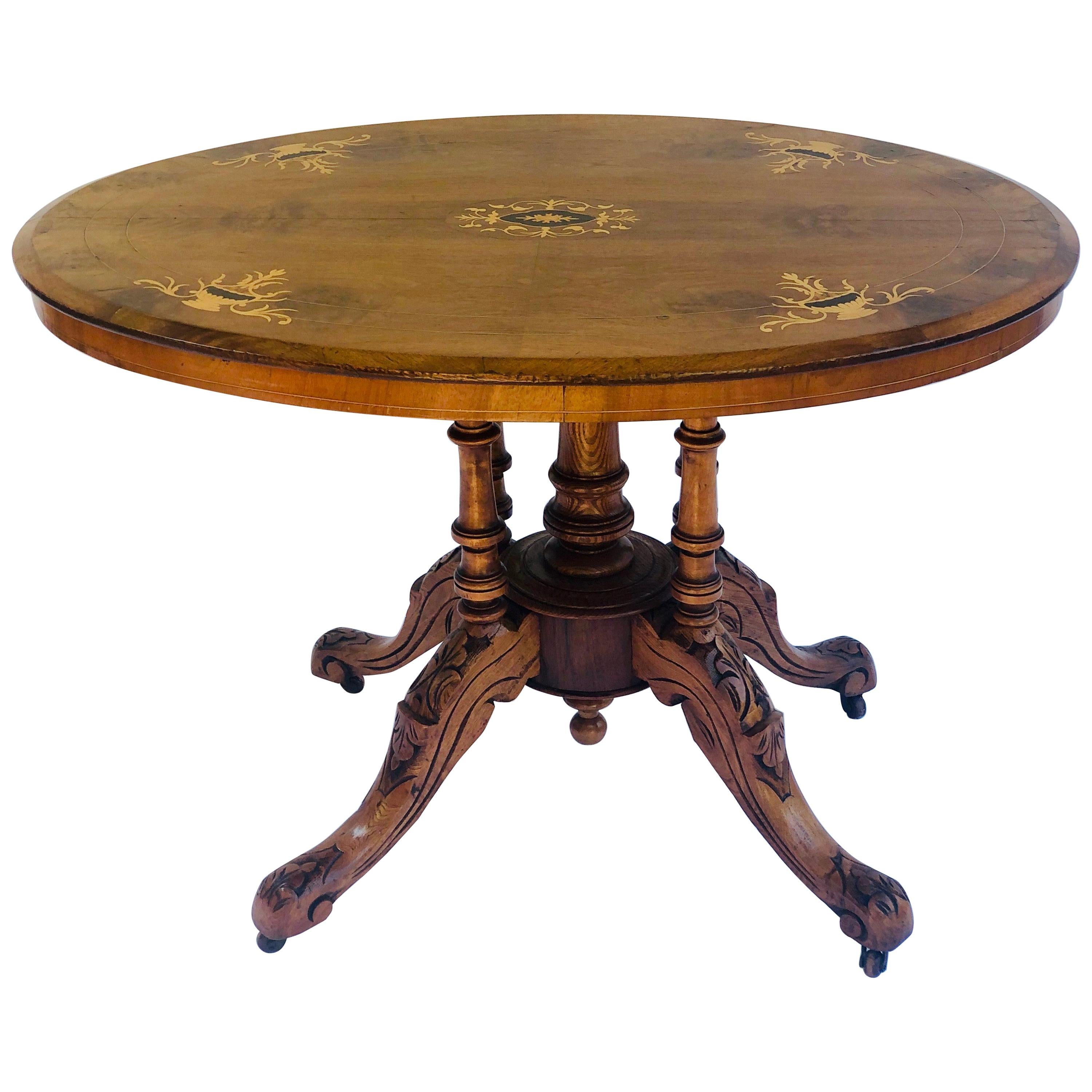 Table centrale ovale victorienne du 19ème siècle en noyer incrusté