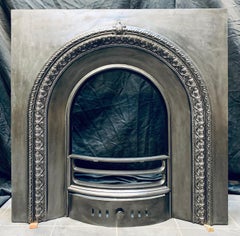 19th Century Victorian Arched Cast Iron Fireplace Insert.