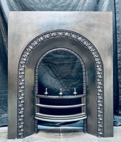 19th Century Victorian Arched Cast Iron Fireplace Insert.