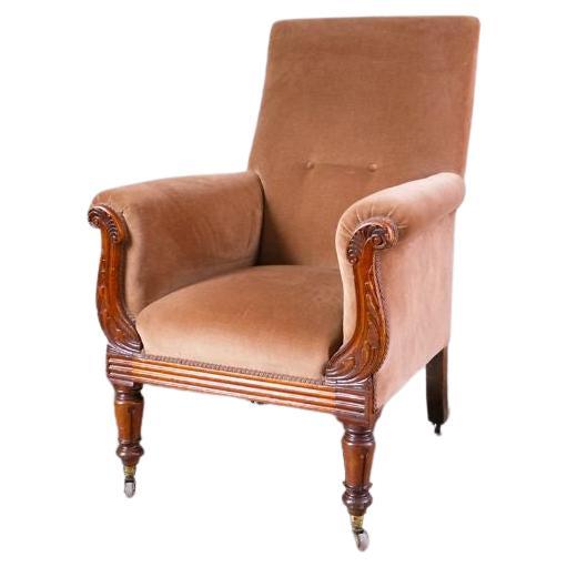 An English Victorian armchair, 19th century, raised on mahogany turned front legs with original brass castors and buttoned back. 

Style reminiscent of Howard but no stamps on castors. 


Dimensions: H105.5 x W75 x D70 cm.