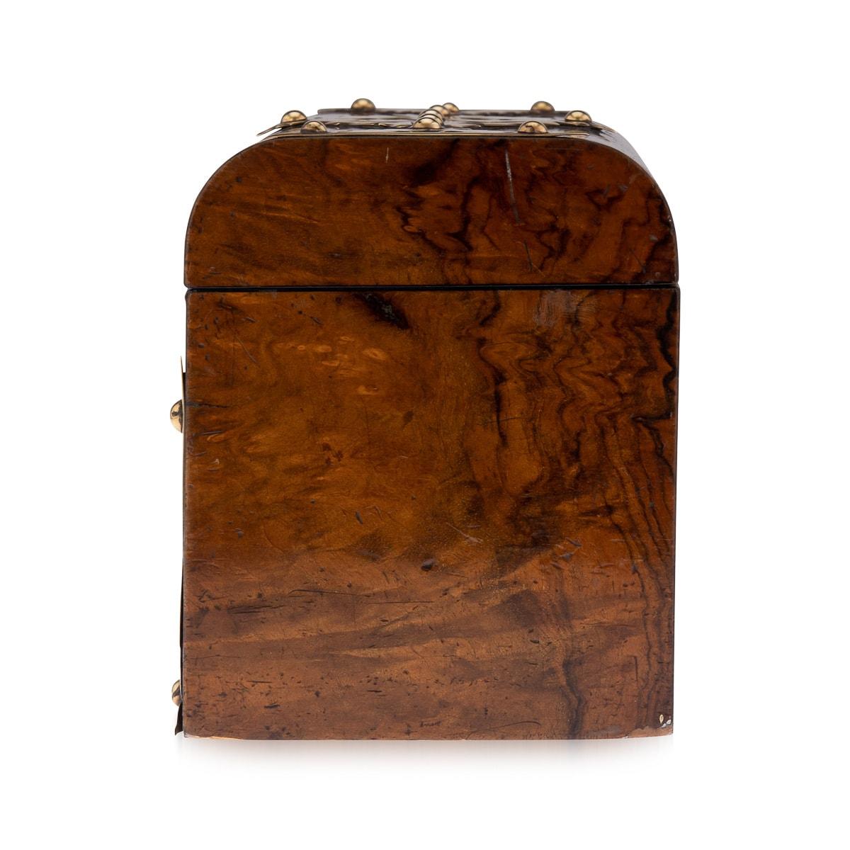 A superb antique Victorian burr walnut casket or trinket box with elaborate decorative pierced cut brass mounts, circa 1860 in date. The lid opens to reveal a paper lined interior ready to store trinkets or jewellery of any kind. An extremely