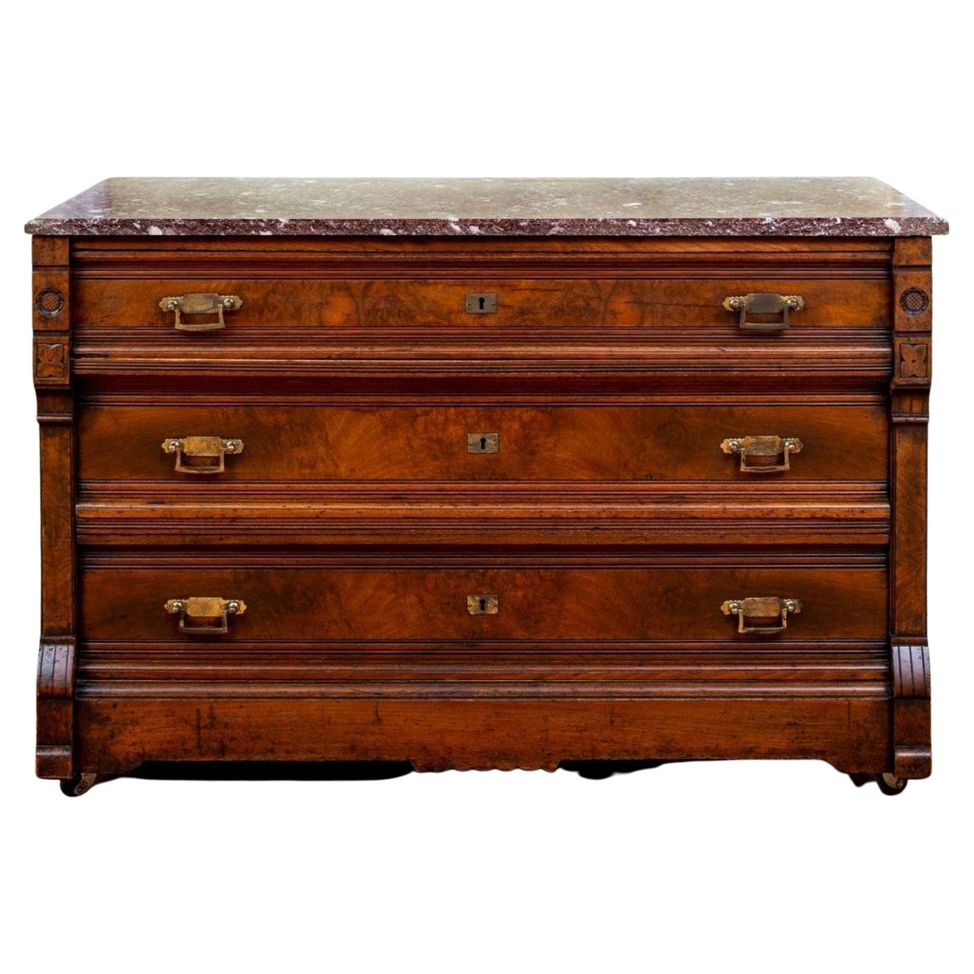 A 19th century Victorian burled walnut marble topped chest of drawers with warm, rich patina. 

The beautifully aged antique commode, circa 1870, retaining the original rectangular shaped 
brown / wine marble top with attractive veining, resting