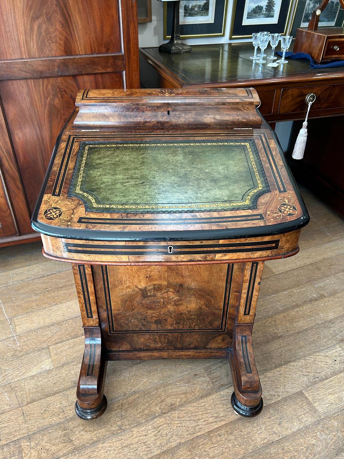 A high quality 19th century Victorian Burr Walnut Inlaid Davenport on a sloping green leather writing surface, Satinwood interior inside with two drawers and original letter racks and a pen tray compartments inside the lift up top. The right hand