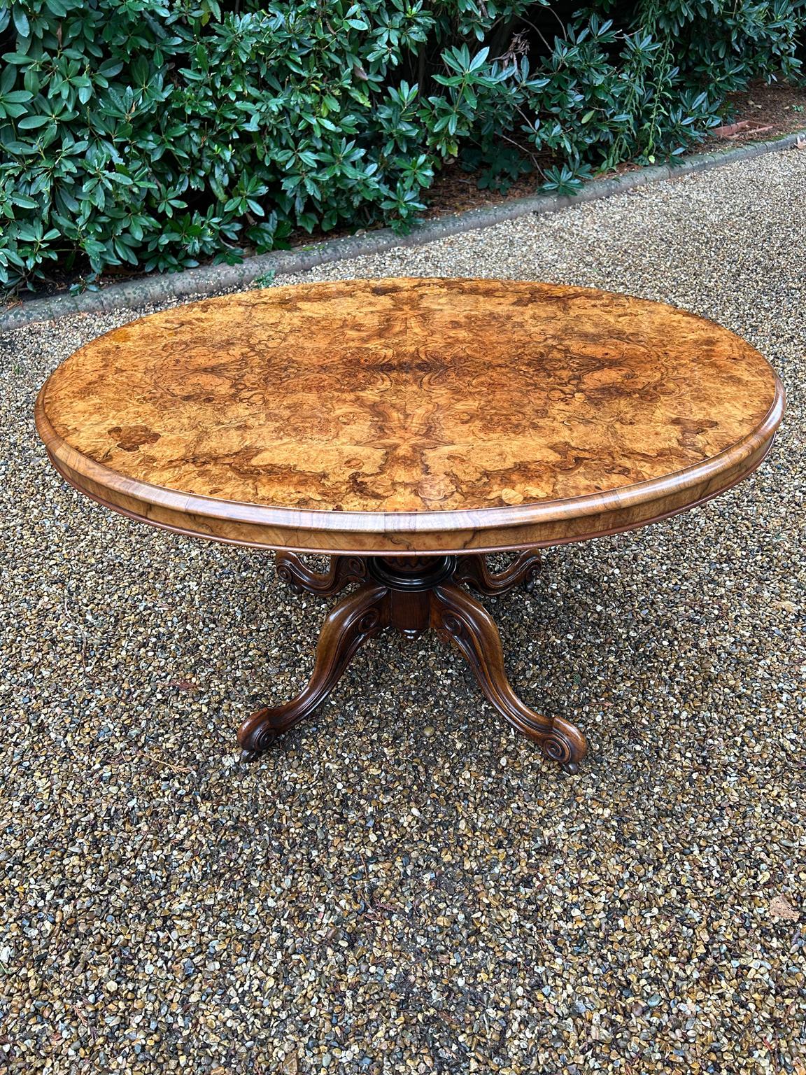 A very high quality 19th Century Victorian Burr Walnut Oval Tilt-Top Breakfast / Dining Table, raised on a turned and carved baluster column and four carved cabriole legs.

Circa: 1850

Dimensions:
Height:  28 inches –  71 cms
Width:  48 inches – 