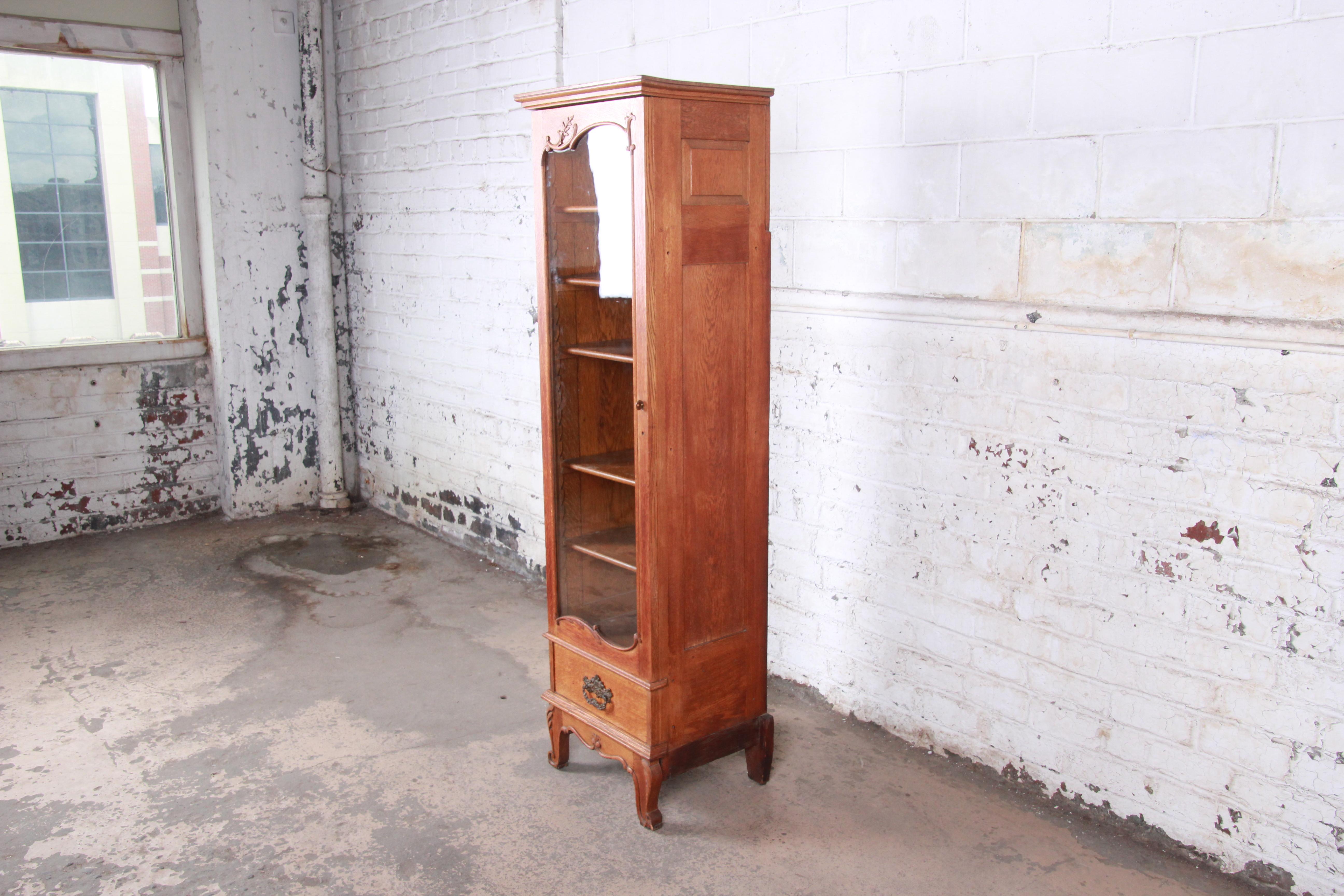 American 19th Century Victorian Carved Oak Narrow Glass Front Bookcase or Display Cabinet