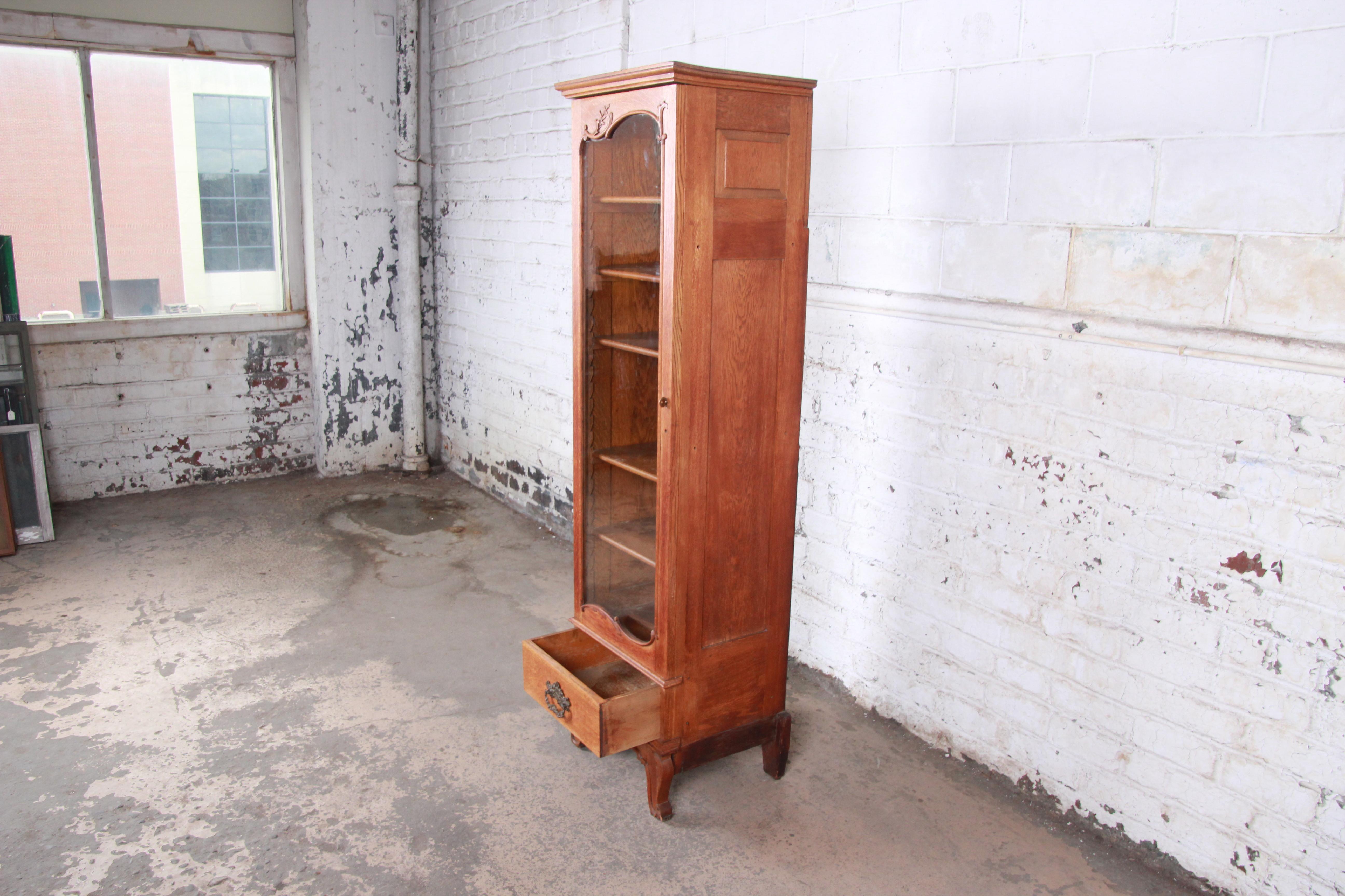 Brass 19th Century Victorian Carved Oak Narrow Glass Front Bookcase or Display Cabinet