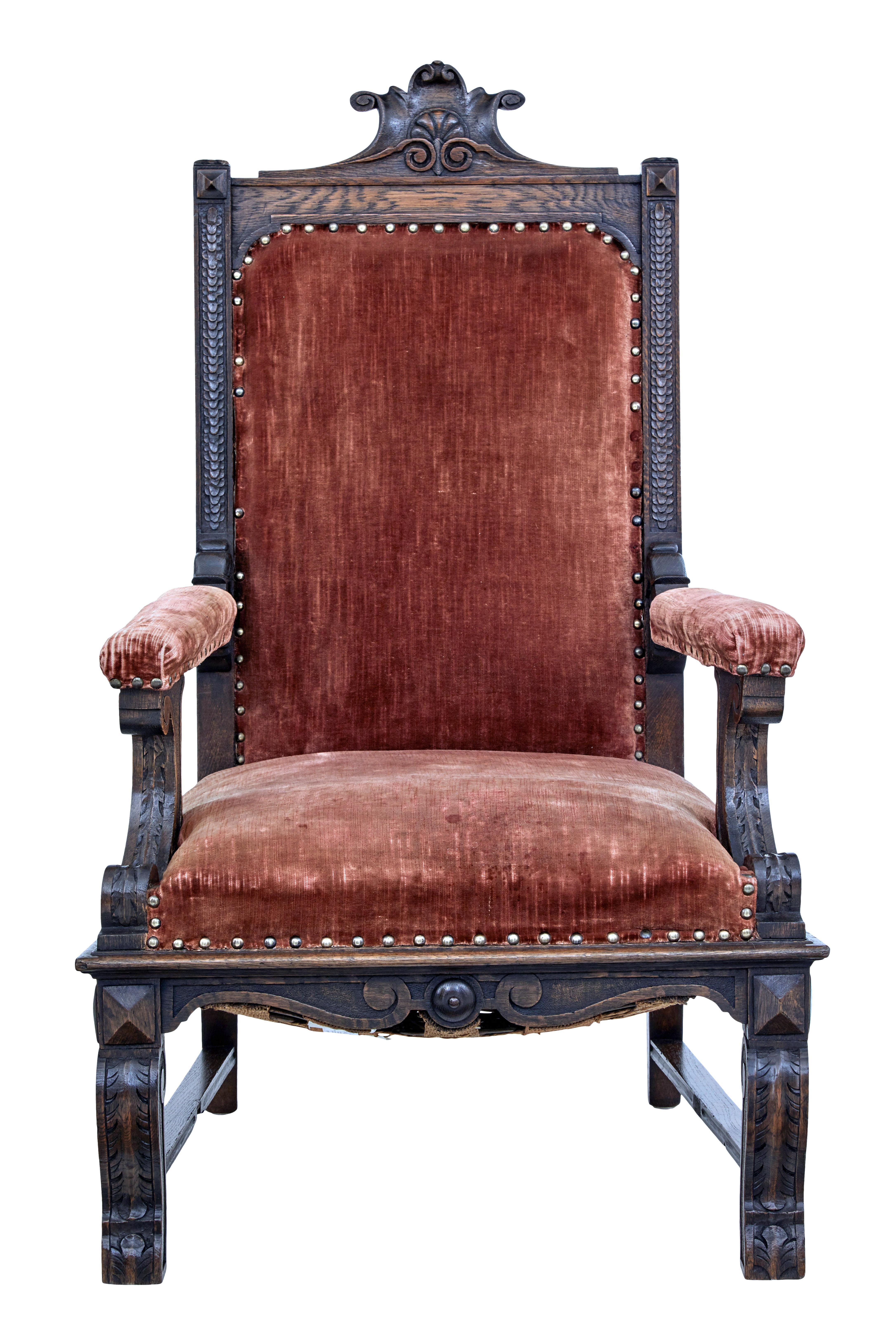 19th century Victorian carved oak throne chair, circa 1880.

Grand carved oak throne chair of generous proportions. Carved back rest with scrolls and shell. Scrolled arm supports and carved front legs in the same taste.

Original upholstery