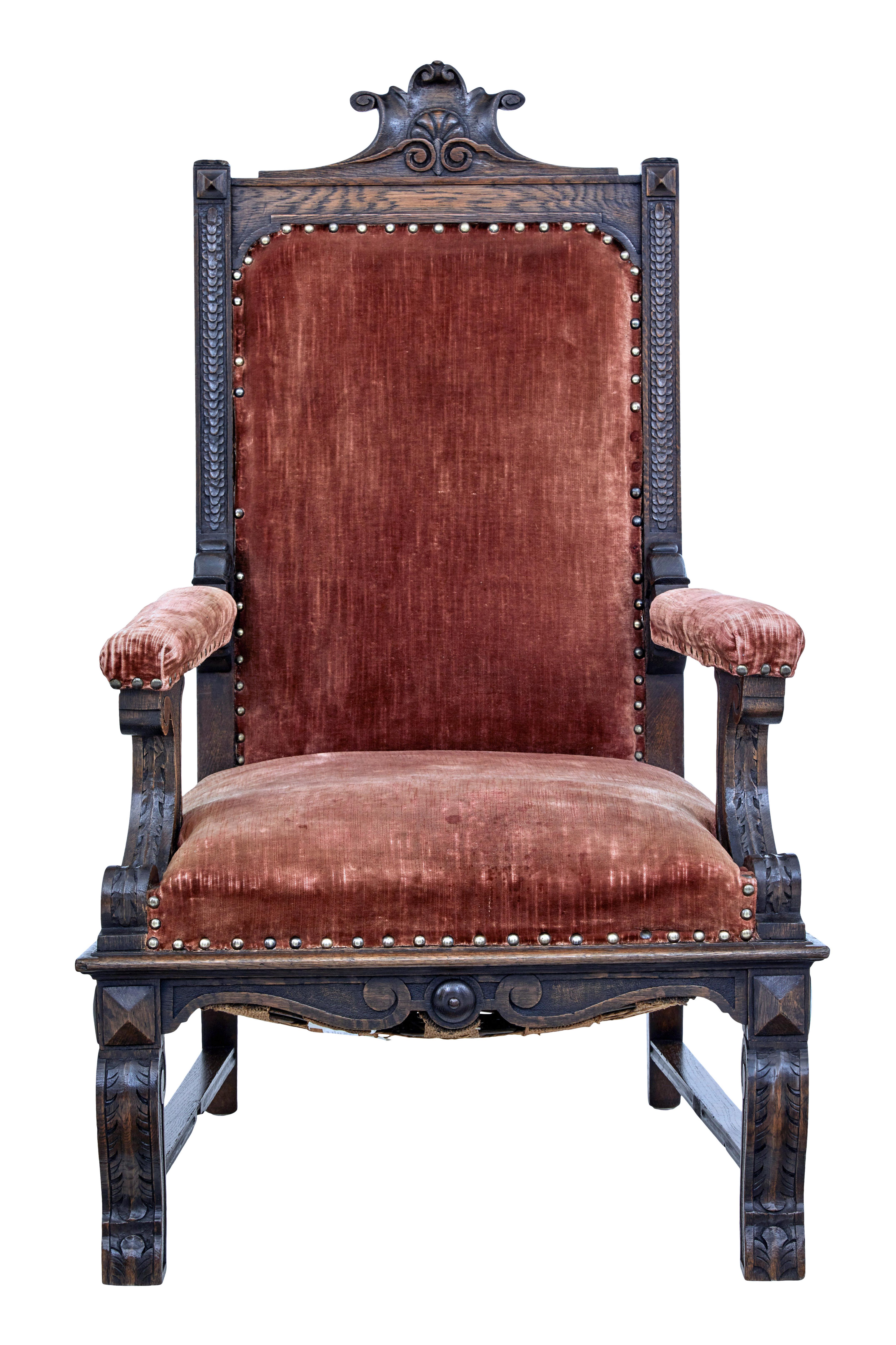 19th century Victorian carved oak throne chair circa 1880.

Grand carved oak throne chair of generous proportions.  Carved back rest with scrolls and shell.  Scrolled arm supports and carved front legs in the same taste.

Original upholstery