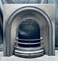 19th Century Victorian Cast Iron Arched Fireplace Insert.