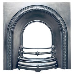 19th Century Victorian Cast Iron Arched Fireplace Insert.