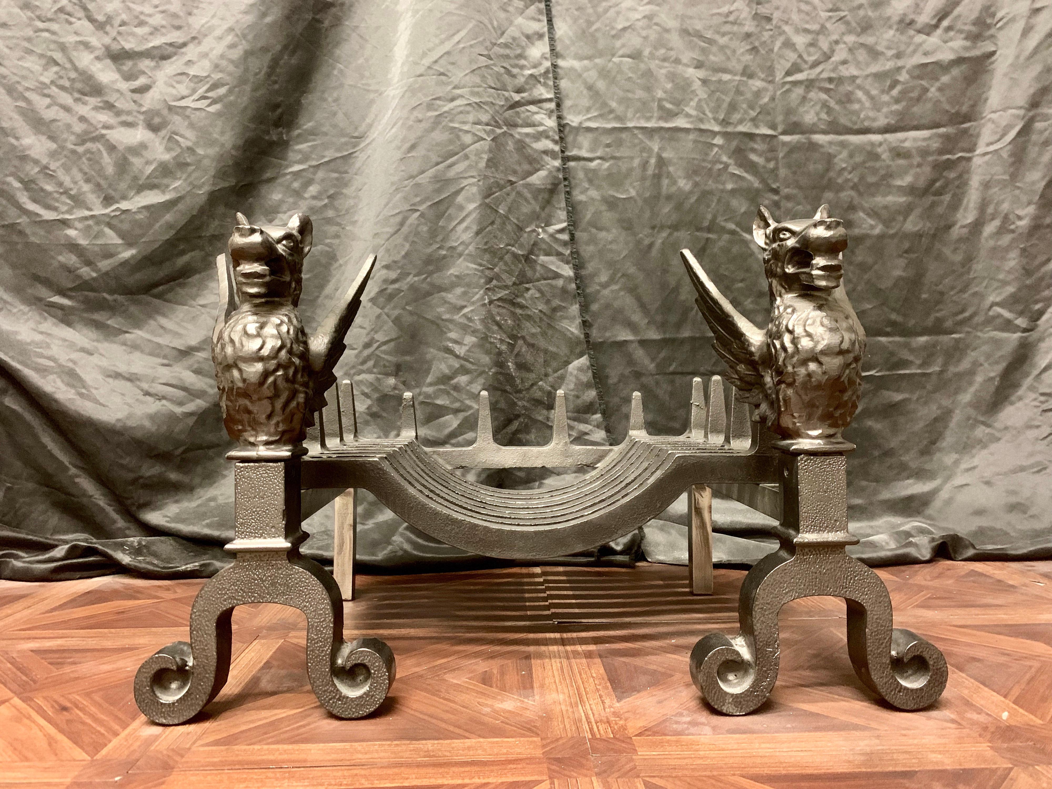 A small 19th century Victorian cast iron fire grate, with a pair of scrolled based griffins hosting the 'Swans Nest' shaped fire grate.
The significance of the mythological Griffin creature stems from Greek Mythology-the beast being half lion, half
