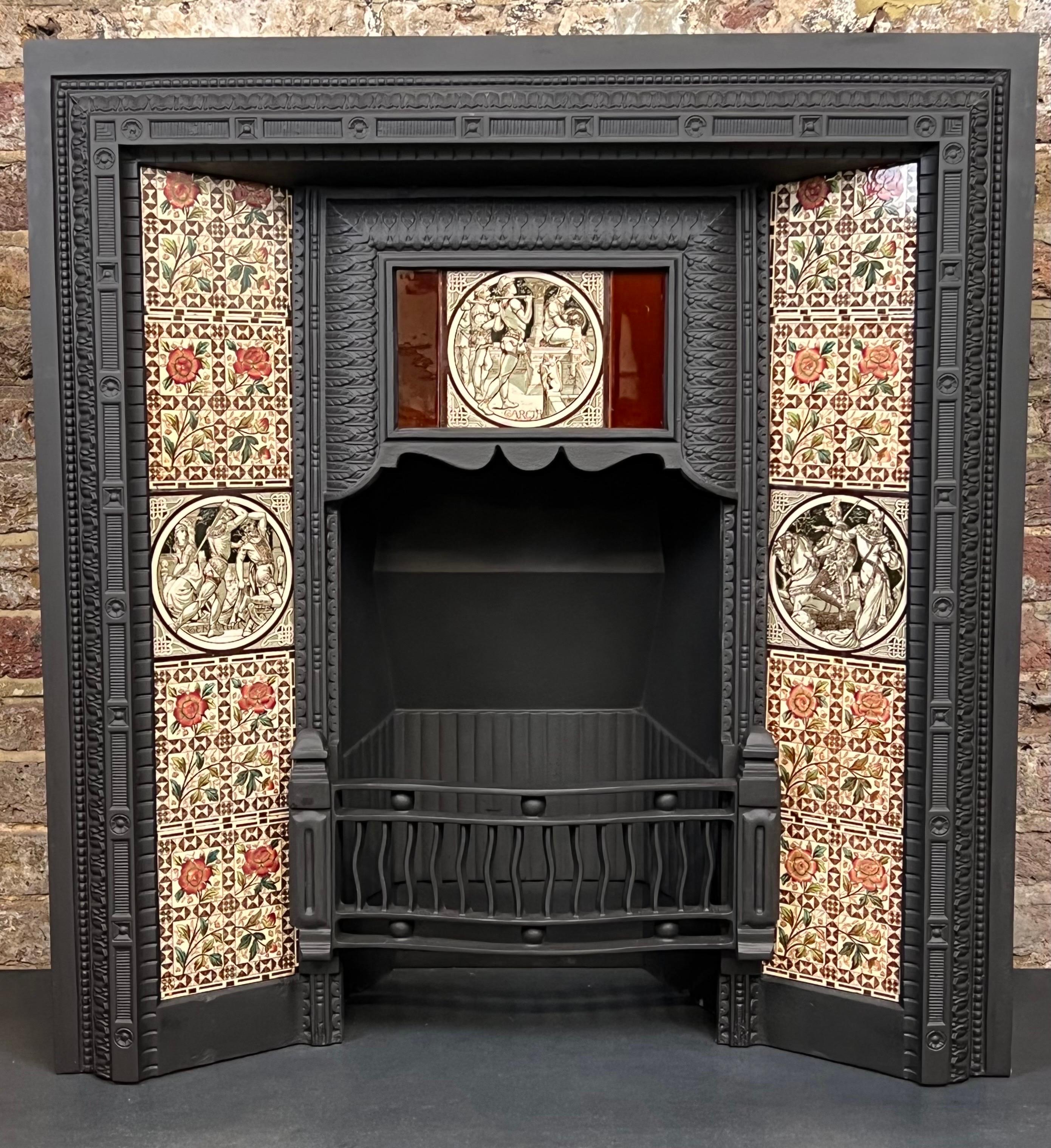 Original 19th Century Victorian Cast Iron Tiled Fireplace Insert.
Recently salvaged fom a central London town house. 
This has been cleaned and blackened to its former glory.
With the original hand painted eleven ceramic art tiles with characters