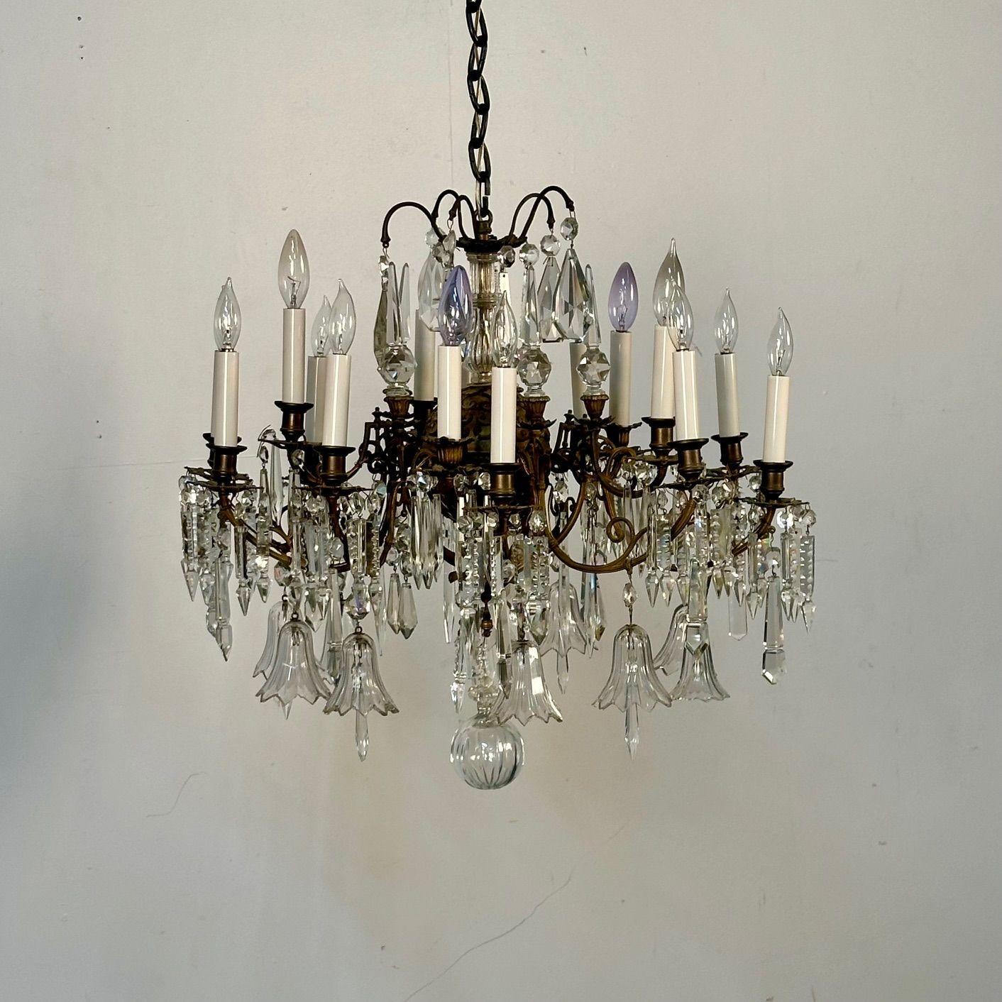 19th Century Victorian Chandelier, Bronze and Crystal,

A solid bronze and crystal Victorian era chandelier having a center circular bronze sphere supporting bronze arms and fine antique crystal adornments. Matching chain and canopy.

26 diameter x