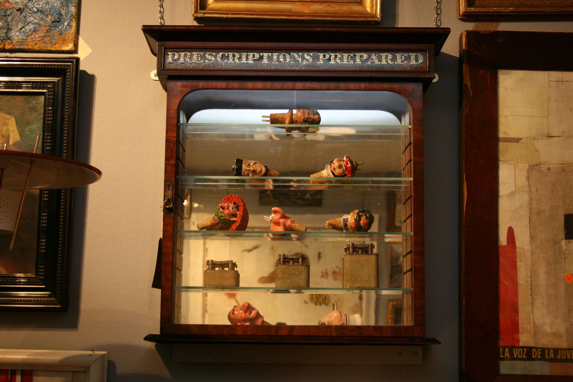 19th Century Antique Victorian chemist shop pharmacy cabinet.
This Pharmacy cabinet dates back to the 1870s.
It has been repolished and the inside mirror and glass shelves have been replaced.
It is in good condition for its age with just a little