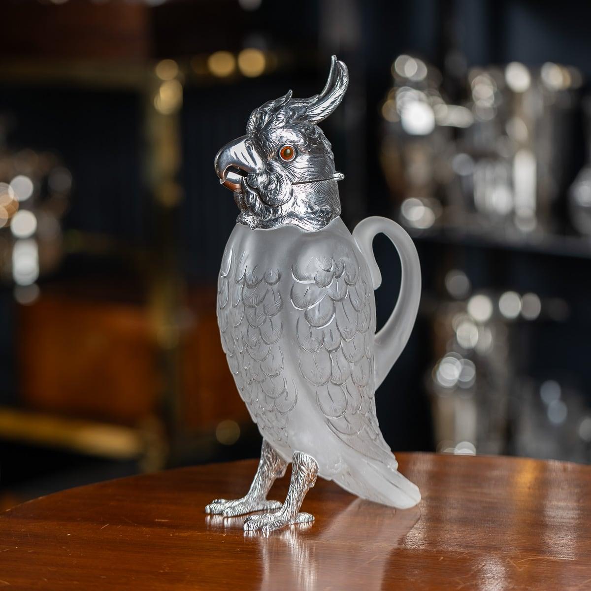 Antique 19th Century Victorian solid silver-mounted etched glass claret jug, solid silver and cut glass mounted novelty wine jug, in the form of a standing cockatoo, set with coloured glass eyes and translucent glass body imitating textured plumage,
