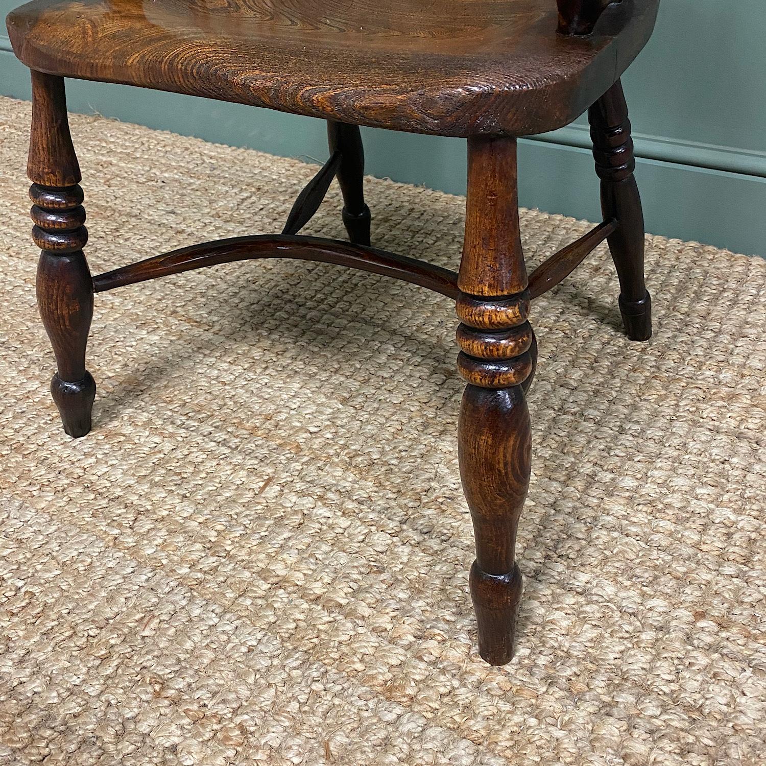 Victorian country oak antique windsor chair

This mid-19th century Victorian Country House Oak & Elm Antique Windsor Chair ca. 1860 has a beautiful curved back with pierced back splat and beautiful turned upright supports. The seat is beautifully