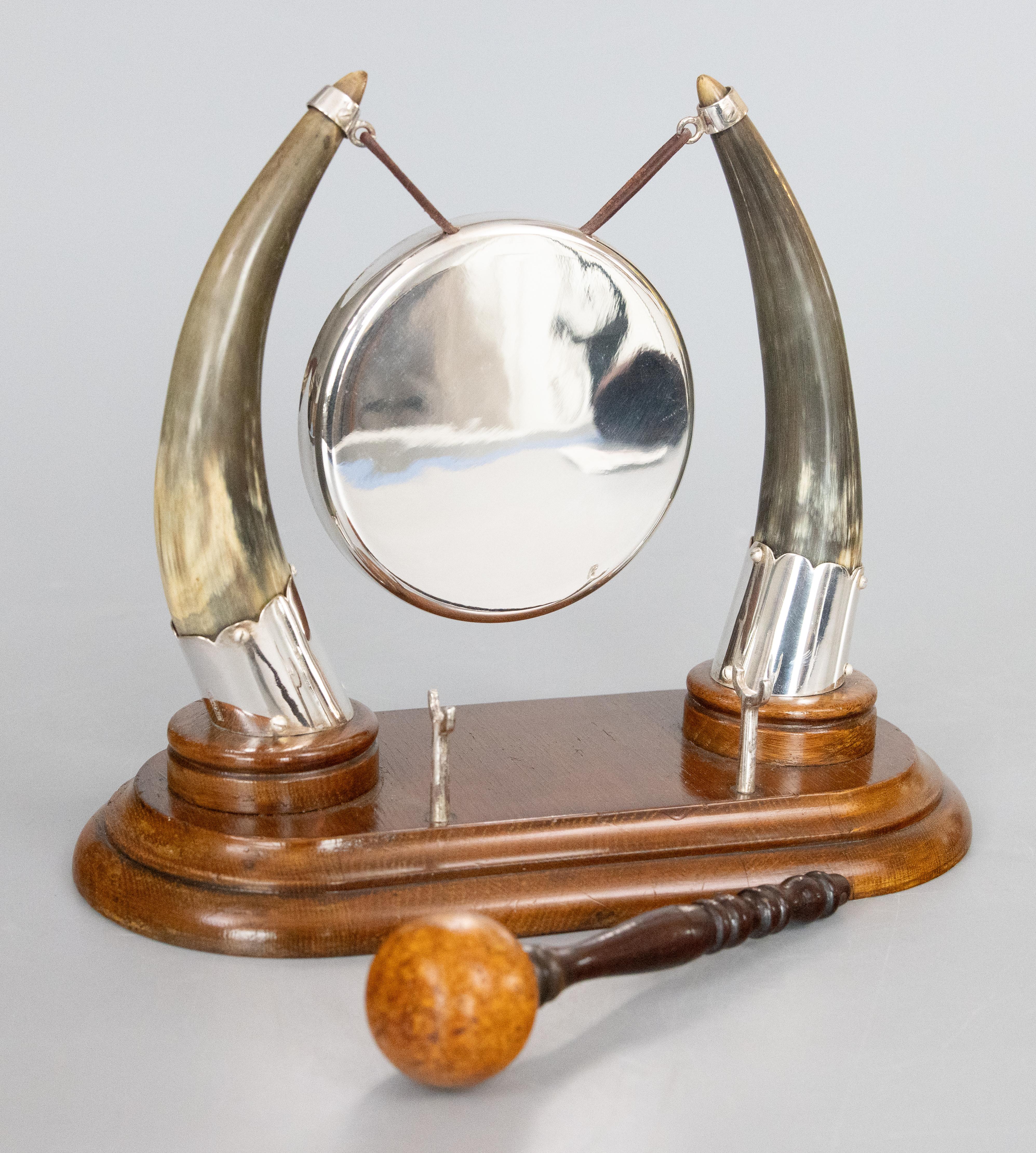 A superb large 19th Century Victorian English silver plate and bovine horn dinner table gong with striker. This fine dinner gong has a beautiful mellow tone and a lovely horn design with newly silver plated mounts and a handsome base made from