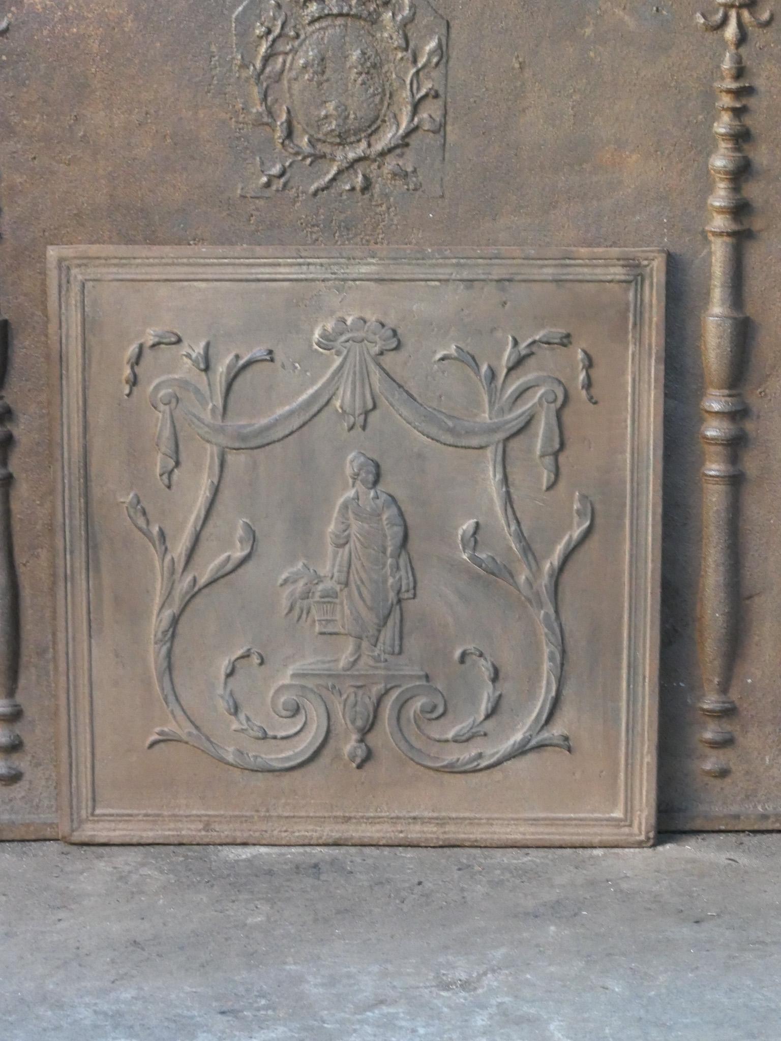 19th century French fireback with an unknown scene with a woman.

The fireback has a brown patina. Upon request it can be made black / pewter colored with stove polish at no extra cost. It is in a good condition and does not have cracks. 