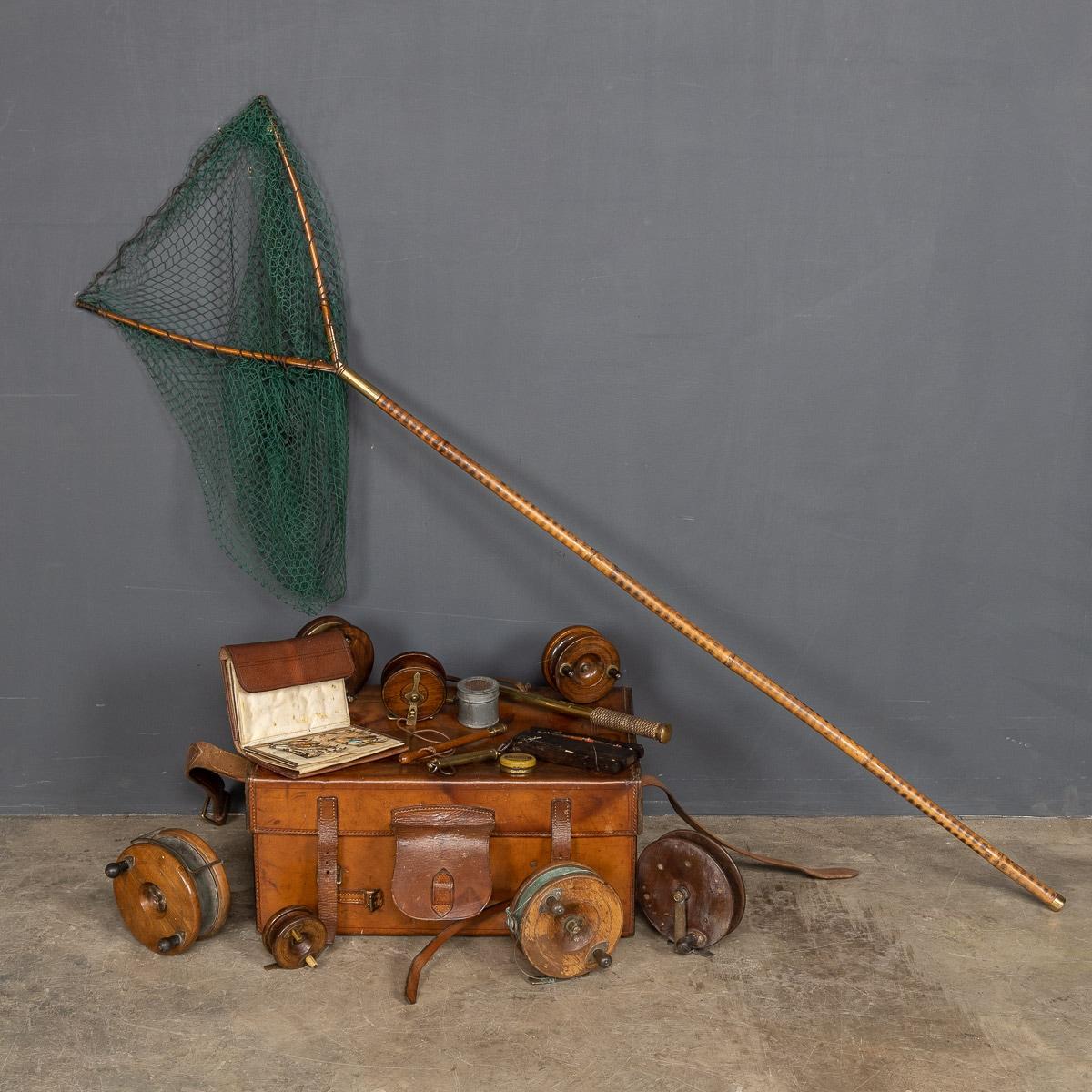 Antique late 19th century Victorian leather tackle trunk by Hardy Brothers, although starting out as gunsmiths in 1872 the brothers were soon selling superior fishing equipment in 1876. This fishing trunk contain a collection of reels lovingly cared