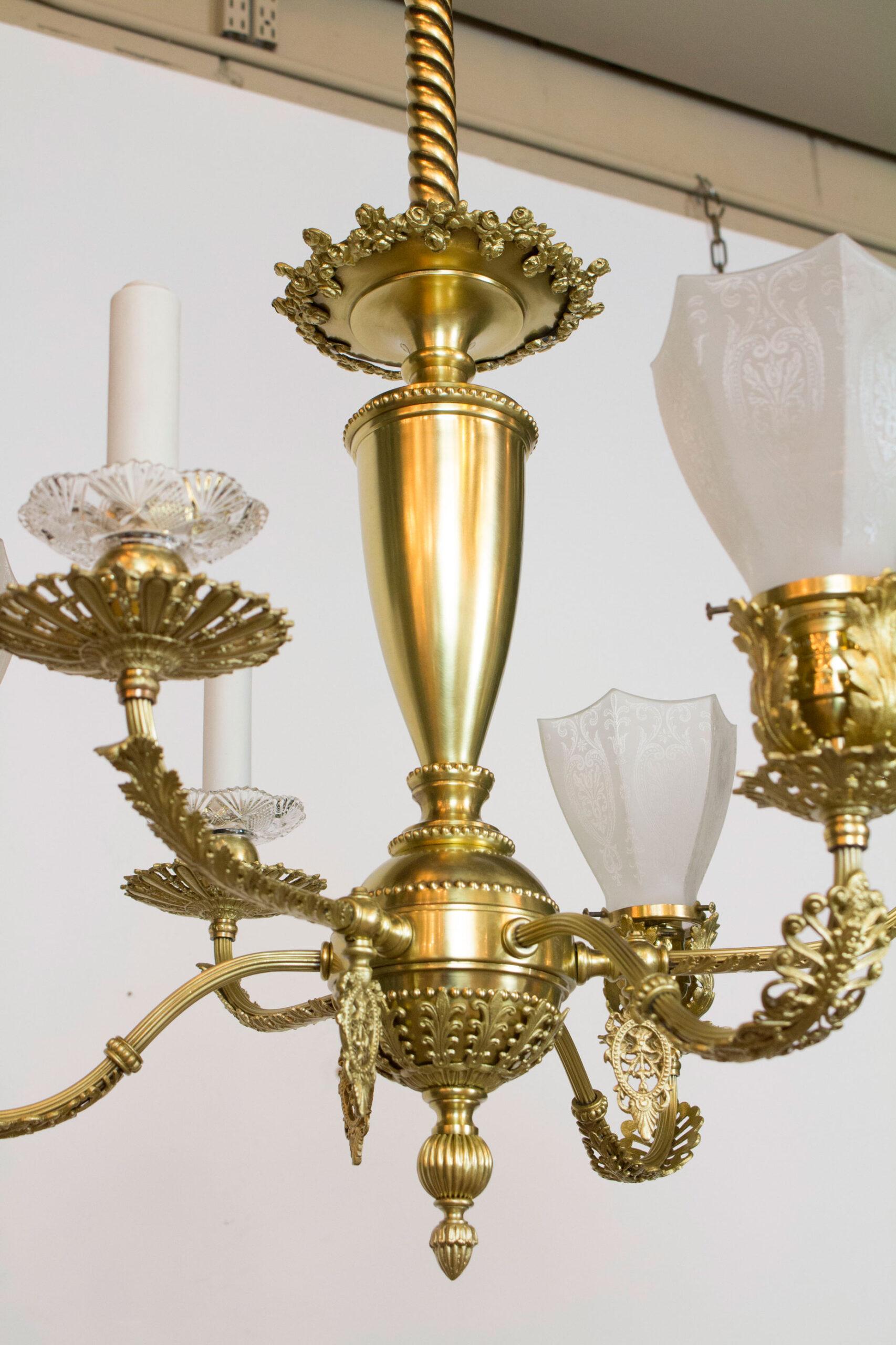 19th century Victorian delicate gas and electric fixture with original glass, original porcelain candle covers and bobeches. Six lights total, three originally electric with glass, and three originally with gas jets with porcelain candle covers.