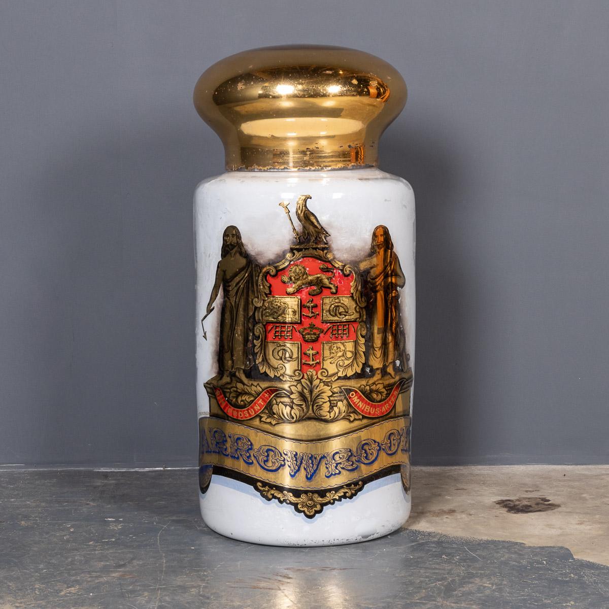 Antique 19th century Victorian handblown glass & reverse hand painted pharmacy jar with polished brass cover.

Measures: Height: 74cm
Width: 33cm.