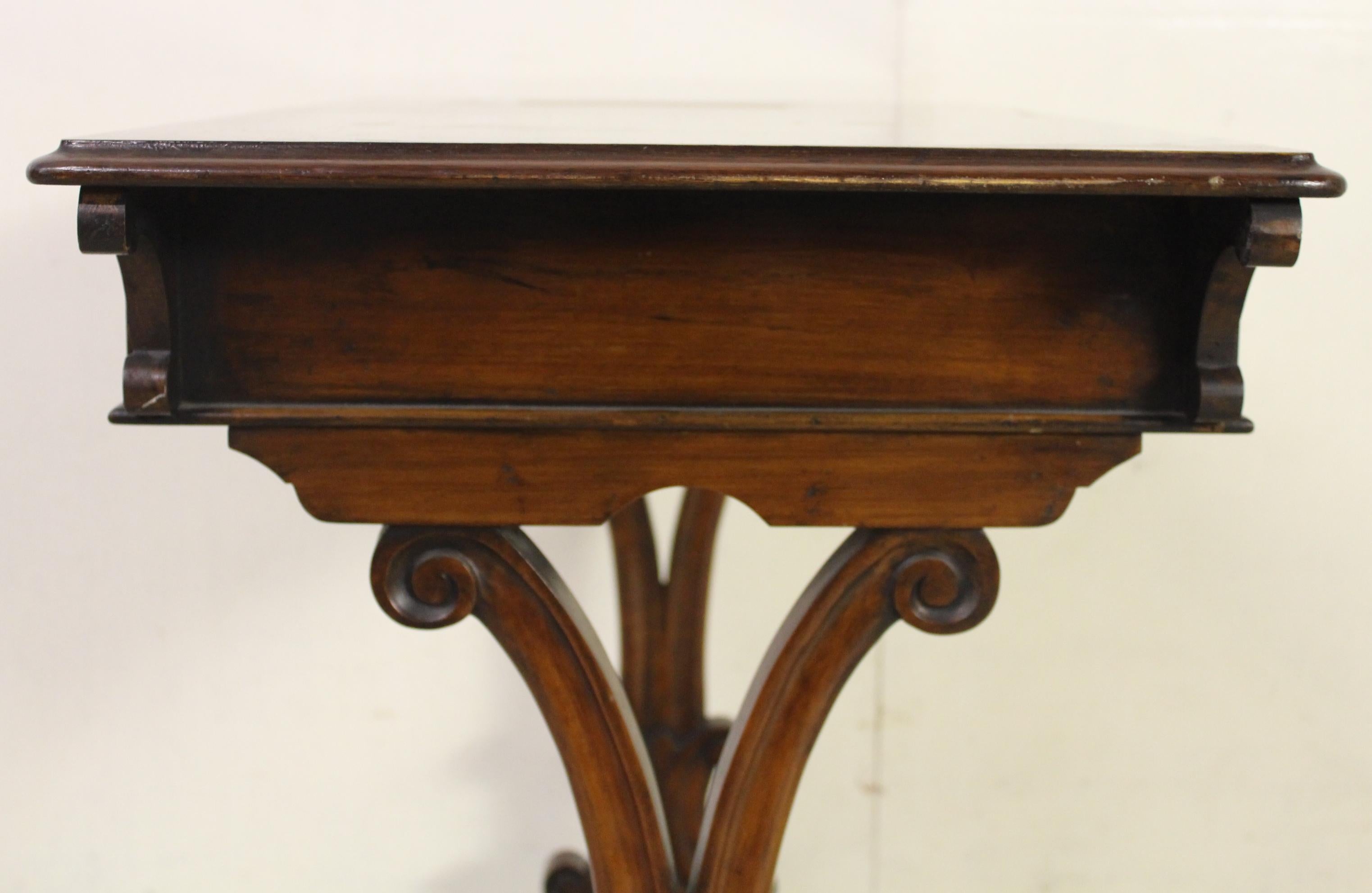 A lovely Victorian period burr walnut side, or lamp, table. Well-constructed in solid walnut with attractive burr walnut veneers to the top. The rectangular top is finished with a moulded edge and decorated with pretty inlaid detailing. There is a