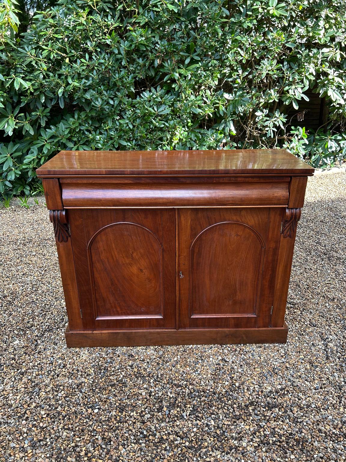 19th Century Victorian Mahogany Chiffonier with single cusion drawer and cupboard, enclosed by two arched panel doors with a shelf on inside, supported on a plinth base.

Circa: 1860

Video: If you require video. Please just let us know by filling
