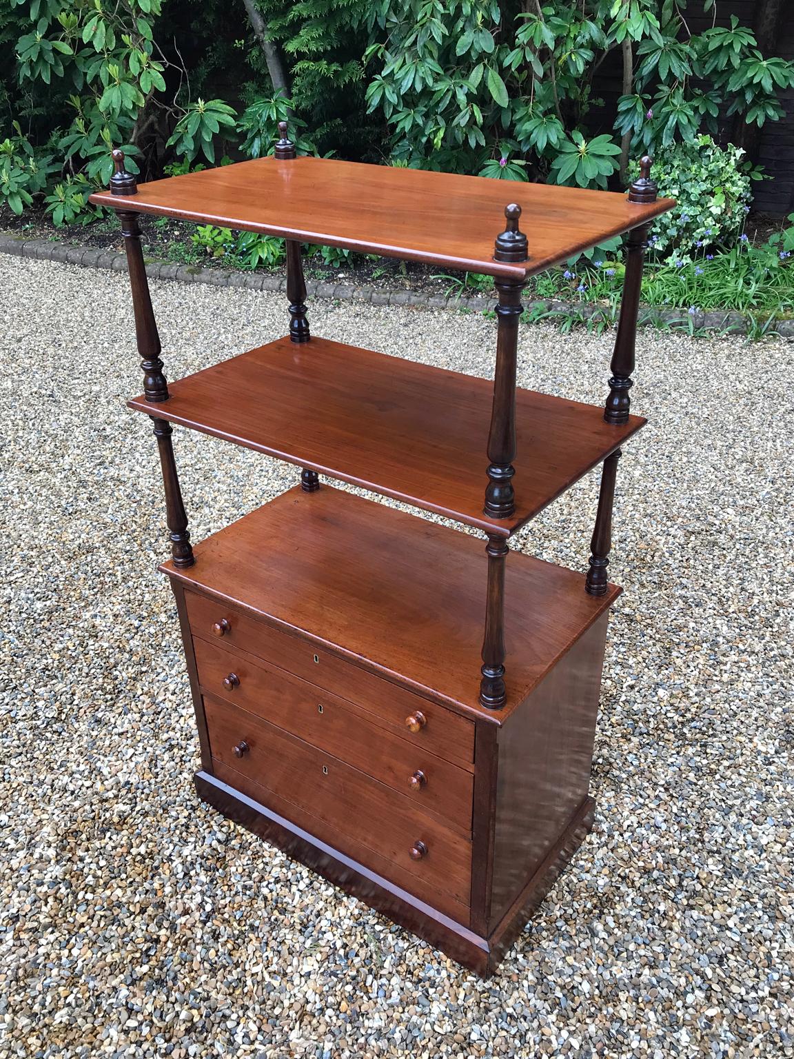 A very high quality 19th Century Victorian Mahogany Whatnot with 3 open shelves raised on turned columns and 3 mahogany lined drawers on plinth base and castors.

Circa: 1850 – 1860

Dimensions:
Width: 26 inches – 66 cms
Height: 44.5 inches –