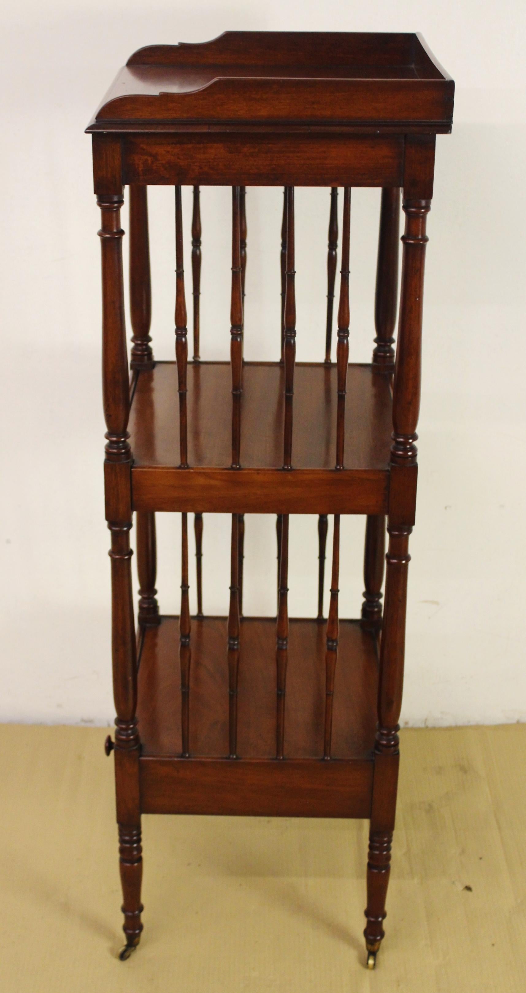 An excellent mid-Victorian period mahogany 3 tier wot not, or dumb waiter. Very well made in solid mahogany, now with a great color and patina. Three tiers, supported by turned columns and with lovely tuned spindles in between. A single drawer to
