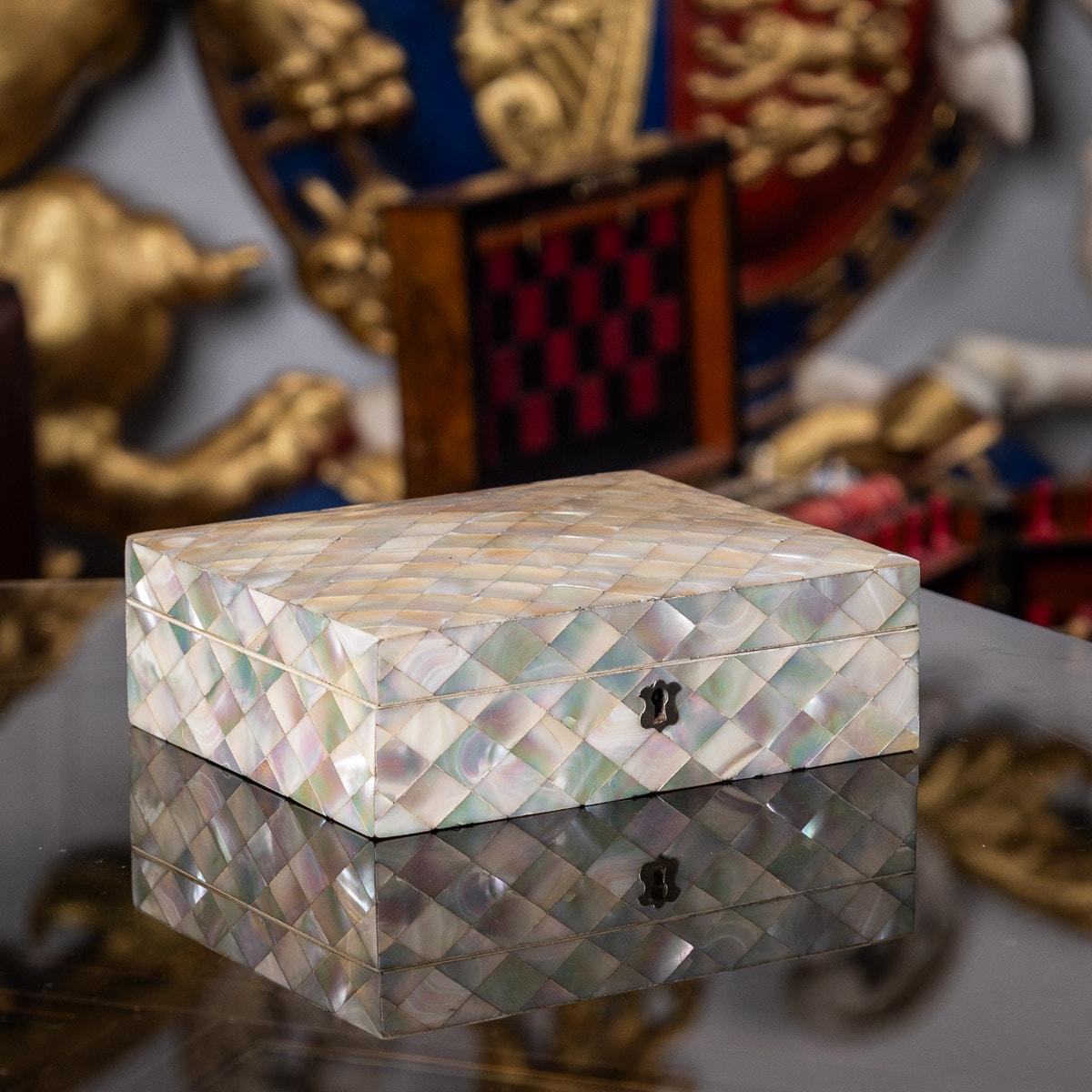 A stunning late 19th Century Victorian mother of pearl applied jewellery box. Dating back to 1880, this box has a fully covered outer body. The inside of the jewellery box features a soft velvet lined interior. The box is totally complete and comes