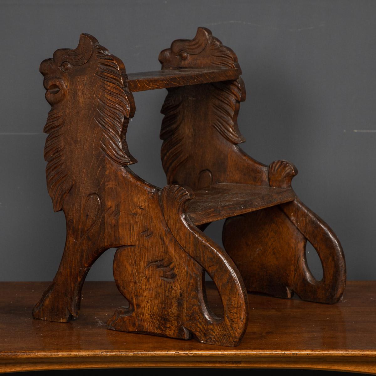 Antique late-19th century Victorian carved oak steps, supported by two carved lions, circa 1890.
They really are as practical today as they were a century ago, giving any room a real statement and conversation piece.

Condition
In great