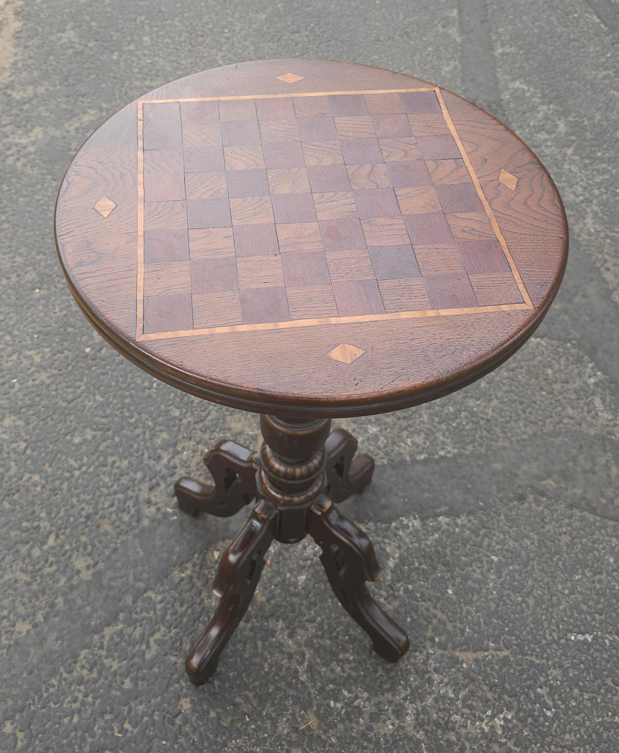 A 19th Century Victorian Oak and Mixed Wood Parquetry oak and walnut and Satinwood Inlay Pedestal Game Table
 Measures 18