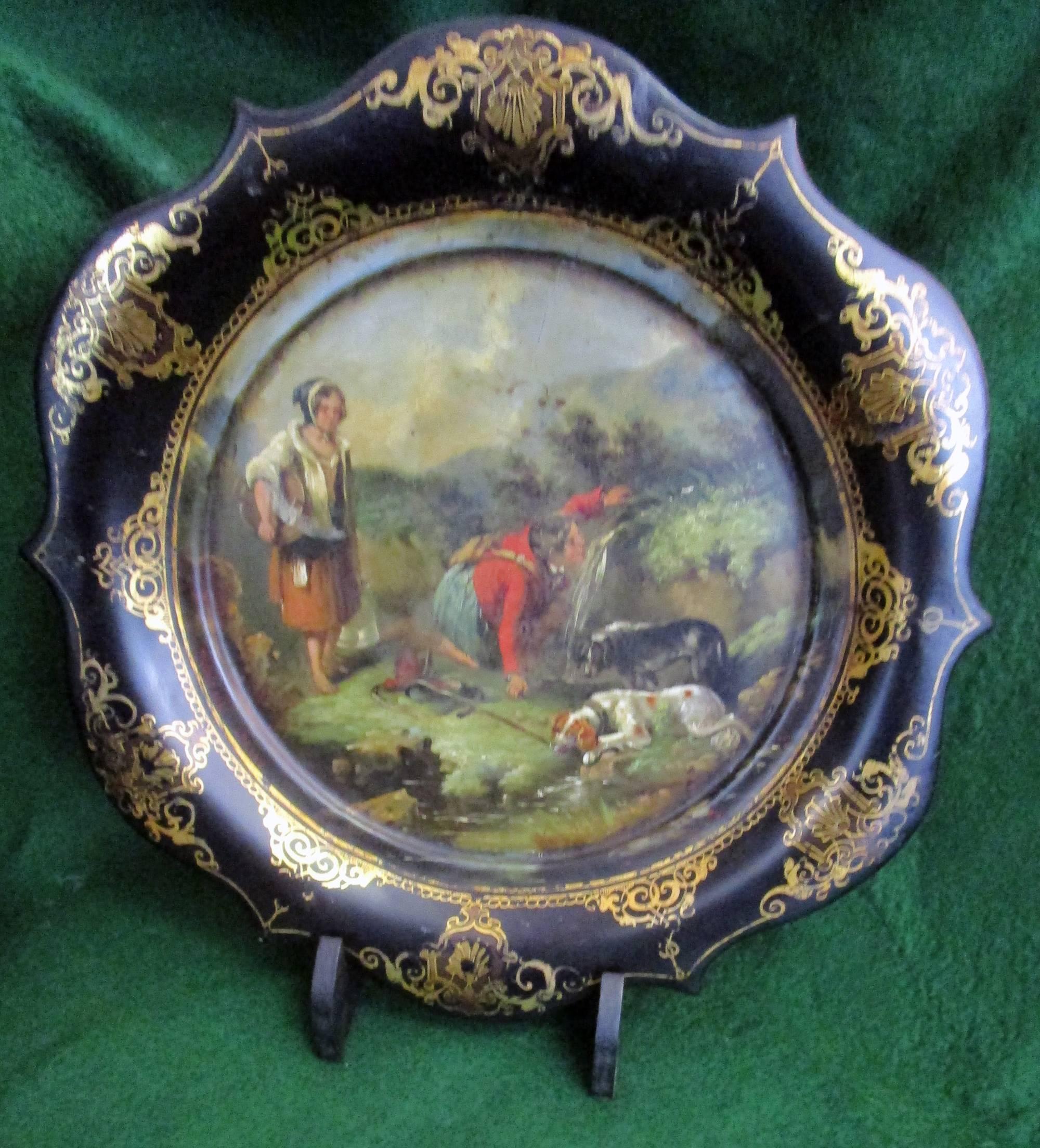 Colorfully painted plate featuring a scalloped edge and made of papier mâché, which was very popular with Victorian England in the mid-1800s. Not only accessories but large furniture pieces were made of Papier Mâché and was a favorite of Queen