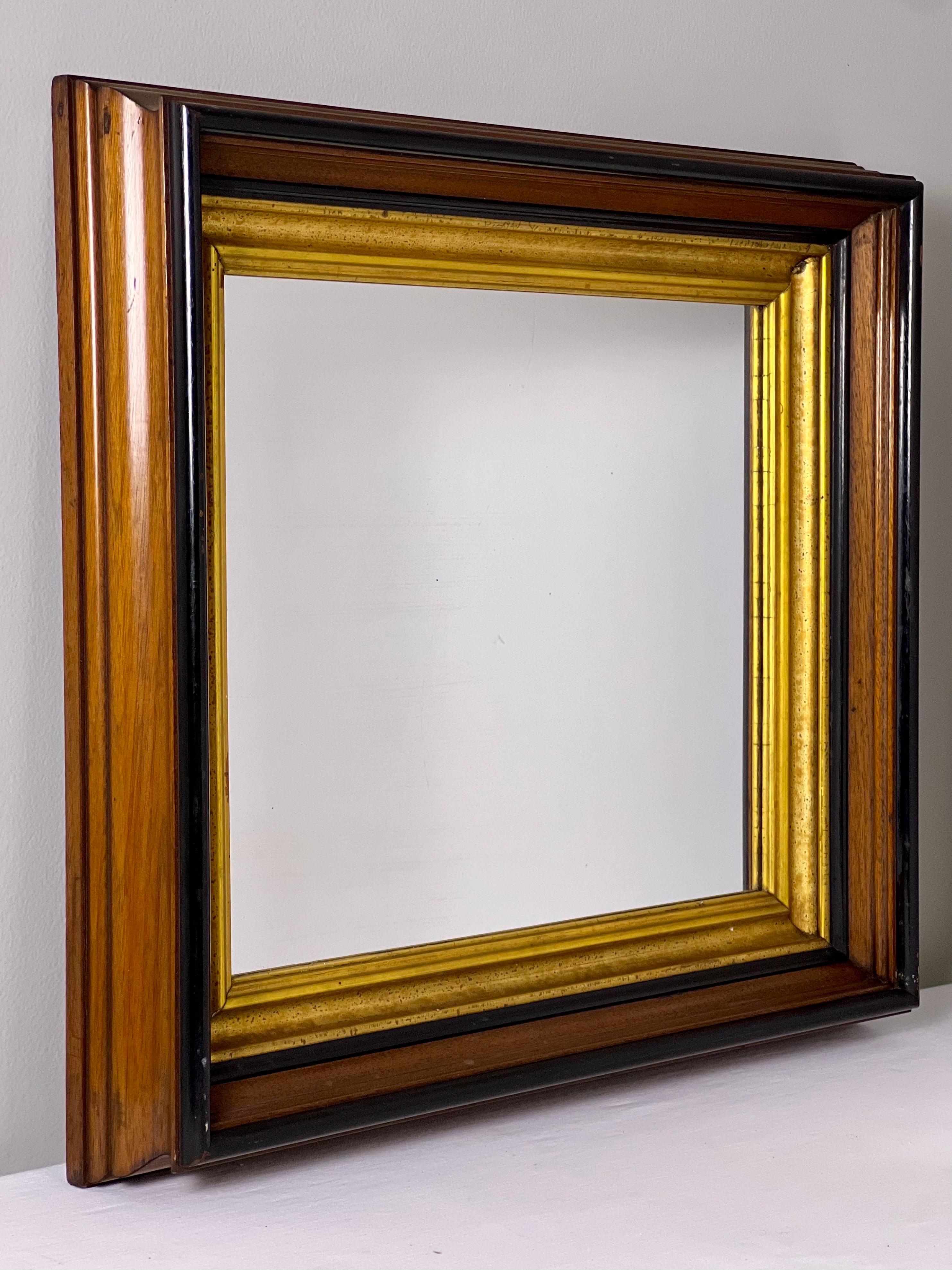 Vittoriano Specchio vittoriano Parcel del XIX secolo in noce dorato ed ebanizzato con cornice profonda in vendita