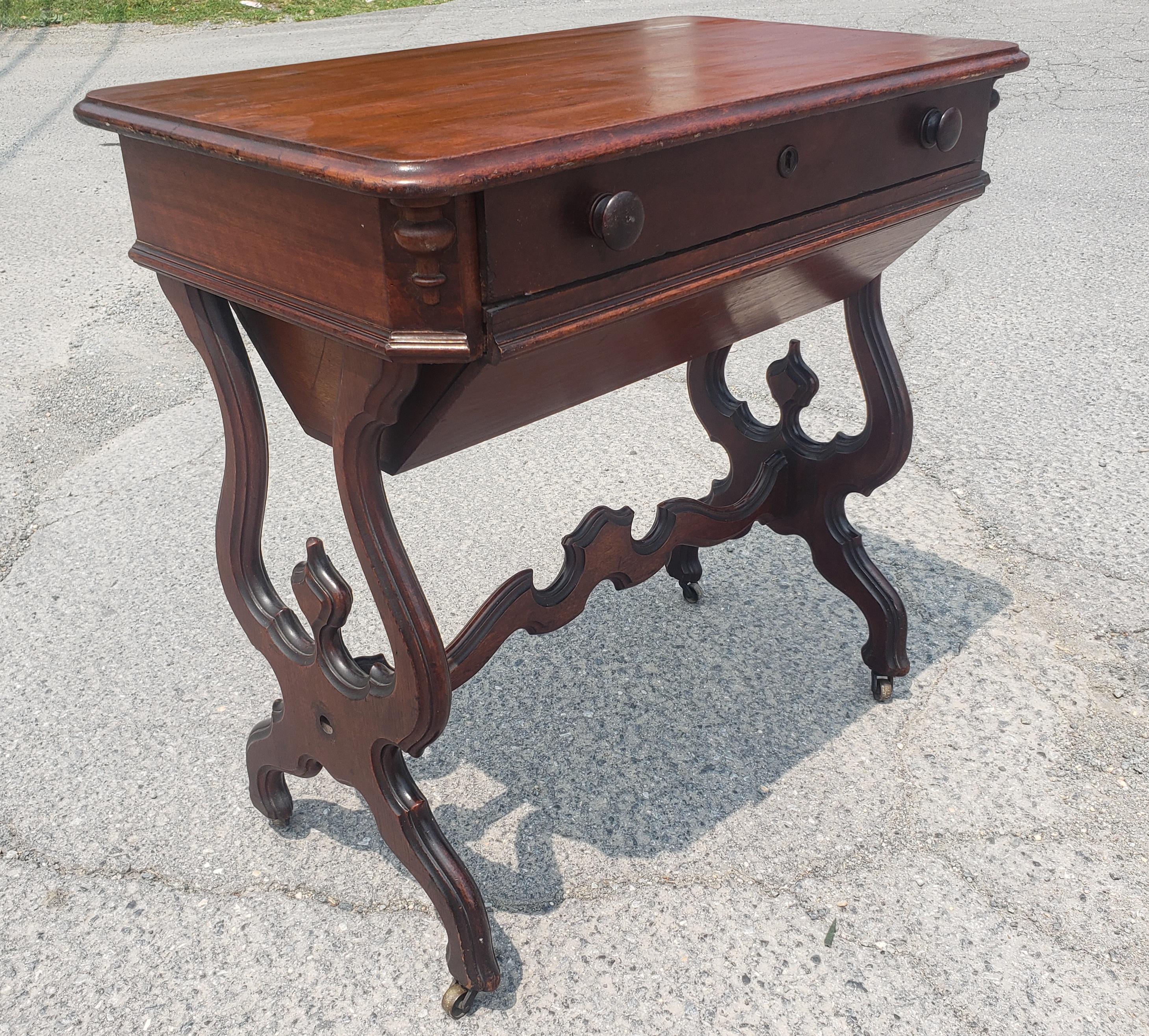 19th Century Victorian Rococo Style Carved Mahogany Rolling Sewing Table In Good Condition For Sale In Germantown, MD