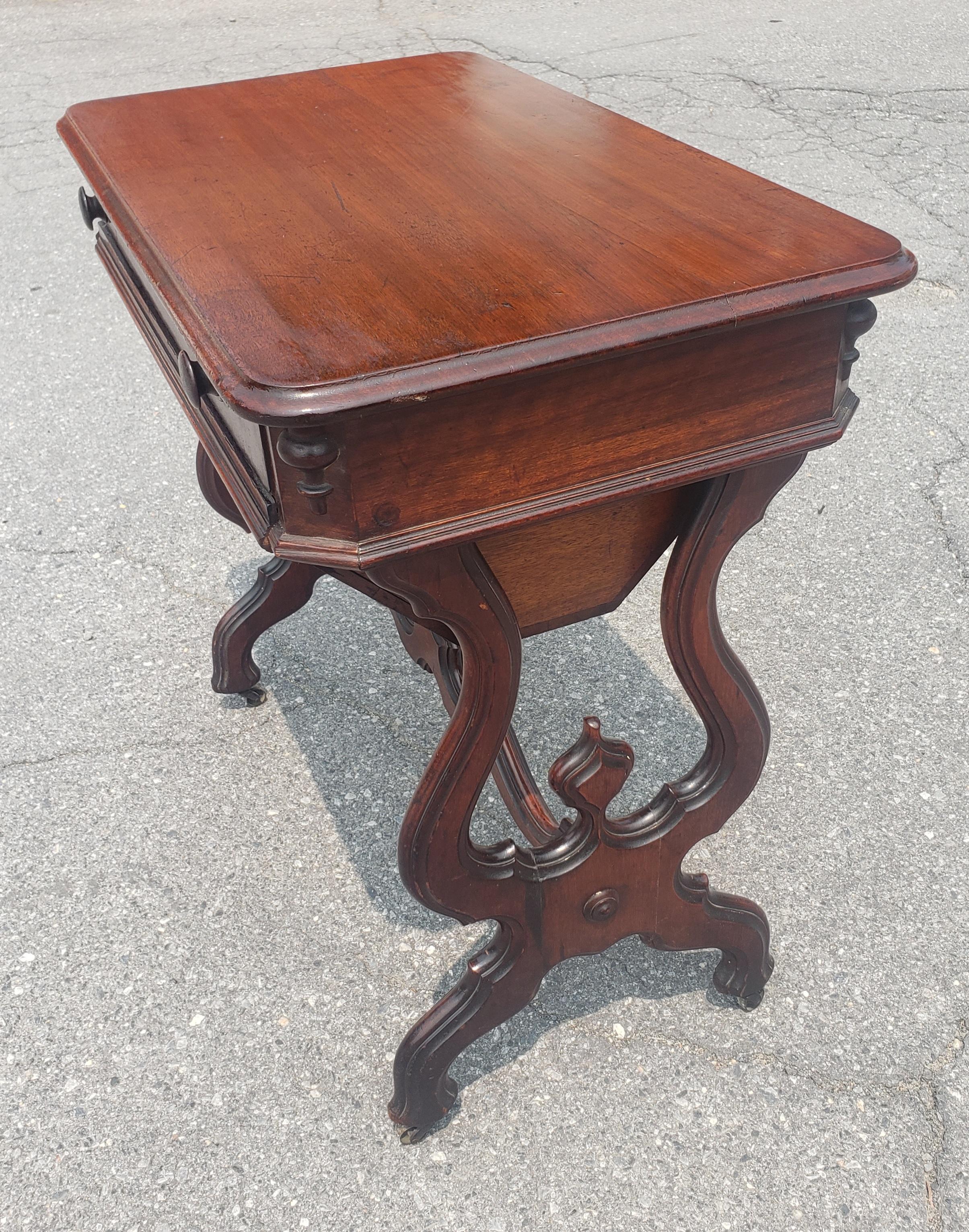 19th Century Victorian Rococo Style Carved Mahogany Rolling Sewing Table For Sale 4