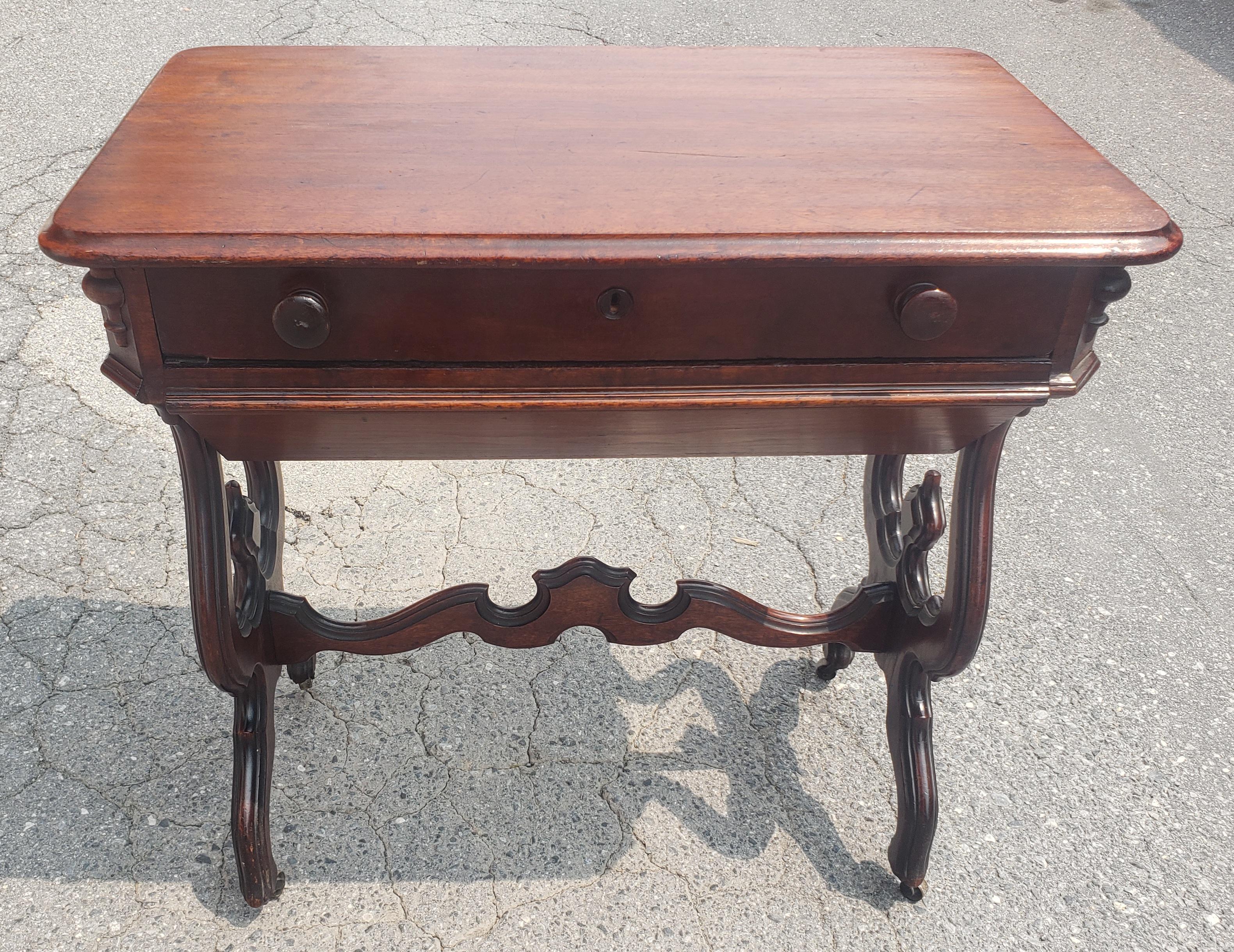 19th Century Victorian Rococo Style Carved Mahogany Rolling Sewing Table For Sale 5