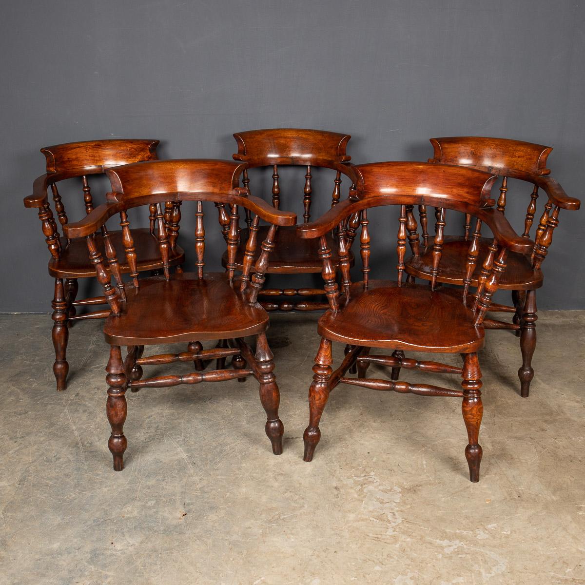 Antique 19th century Victorian set of five elm smokers bow back chairs also known as captains chairs, with beautifully turned legs and spindles.

Condition
In good condition - wear as expected.

Size
Width: 68cm
Depth: 50cm
Height: