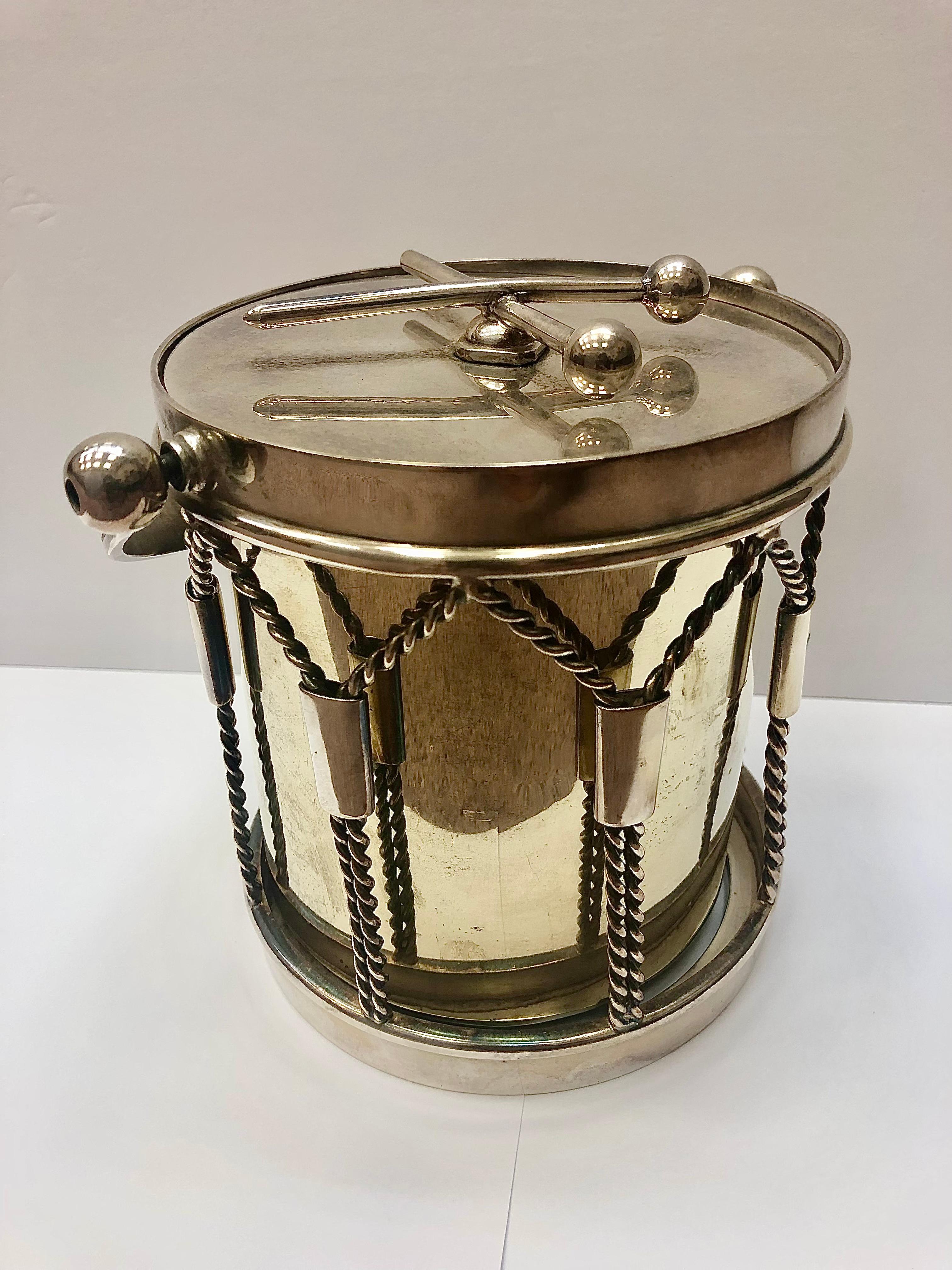 Amazing antique 19th century Victorian silver plated ice bucket in the form of a drum. Removable lid with a pair of drumsticks and twisted rope down the sides. A truly special find for any musician.