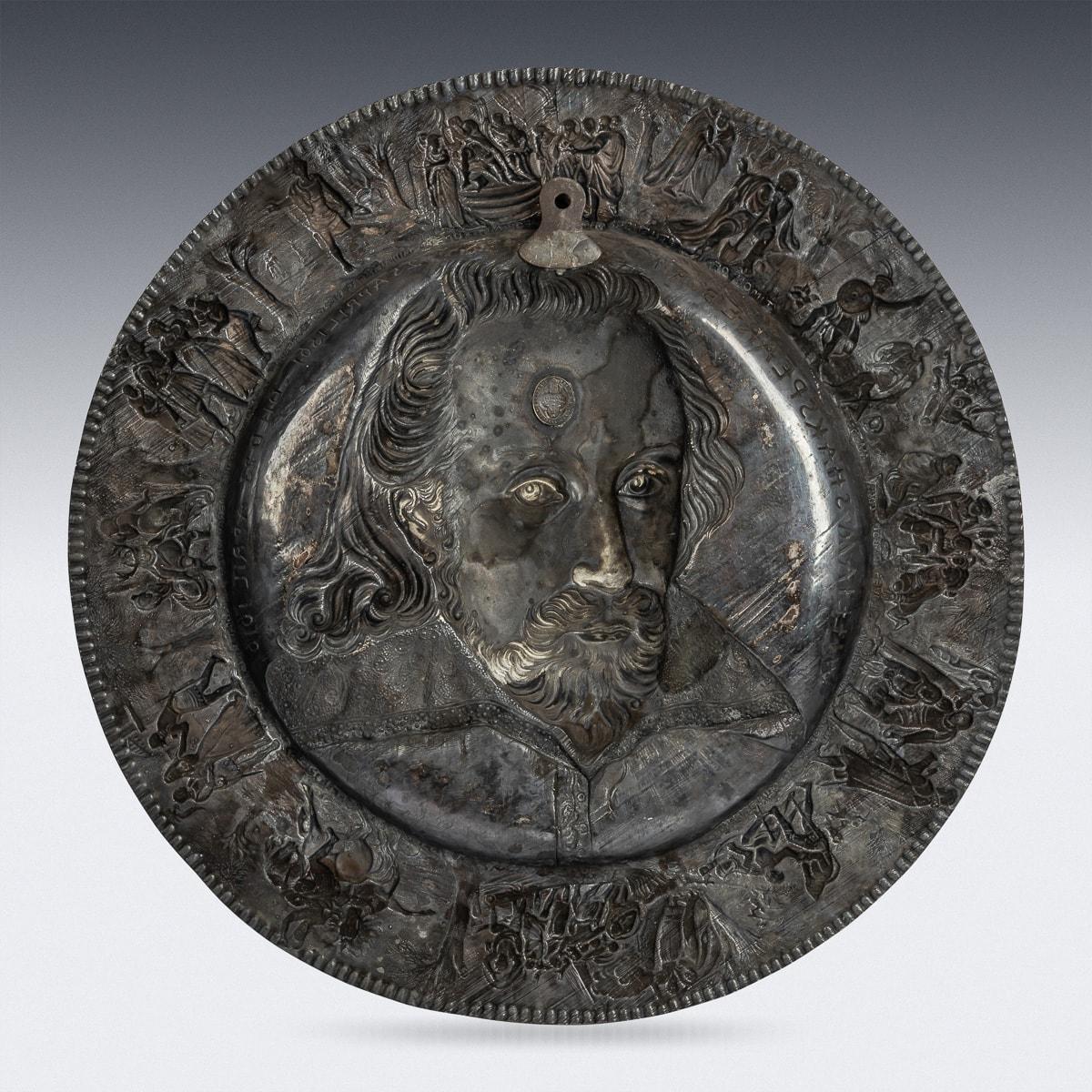 Antique mid 19th Century Victorian electroplated charger, featuring a depiction of William Shakespeare, Born 23 April 1561 - Died 23 April 1616. The charger is of a notably large size, with elaborately embossed border adorned with scenes from