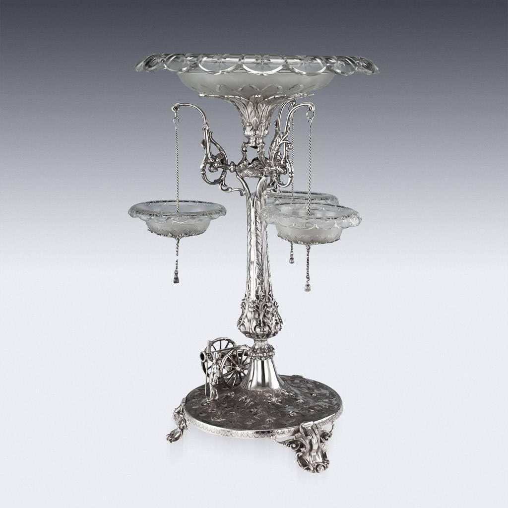 Antique 19th century Victorian impressively large and one of a kind regimental royal artillery centrepiece, the uplifted leaf shaped central column terminating with a flared foliate cut glass bowl, sides applied with three cast branches, each