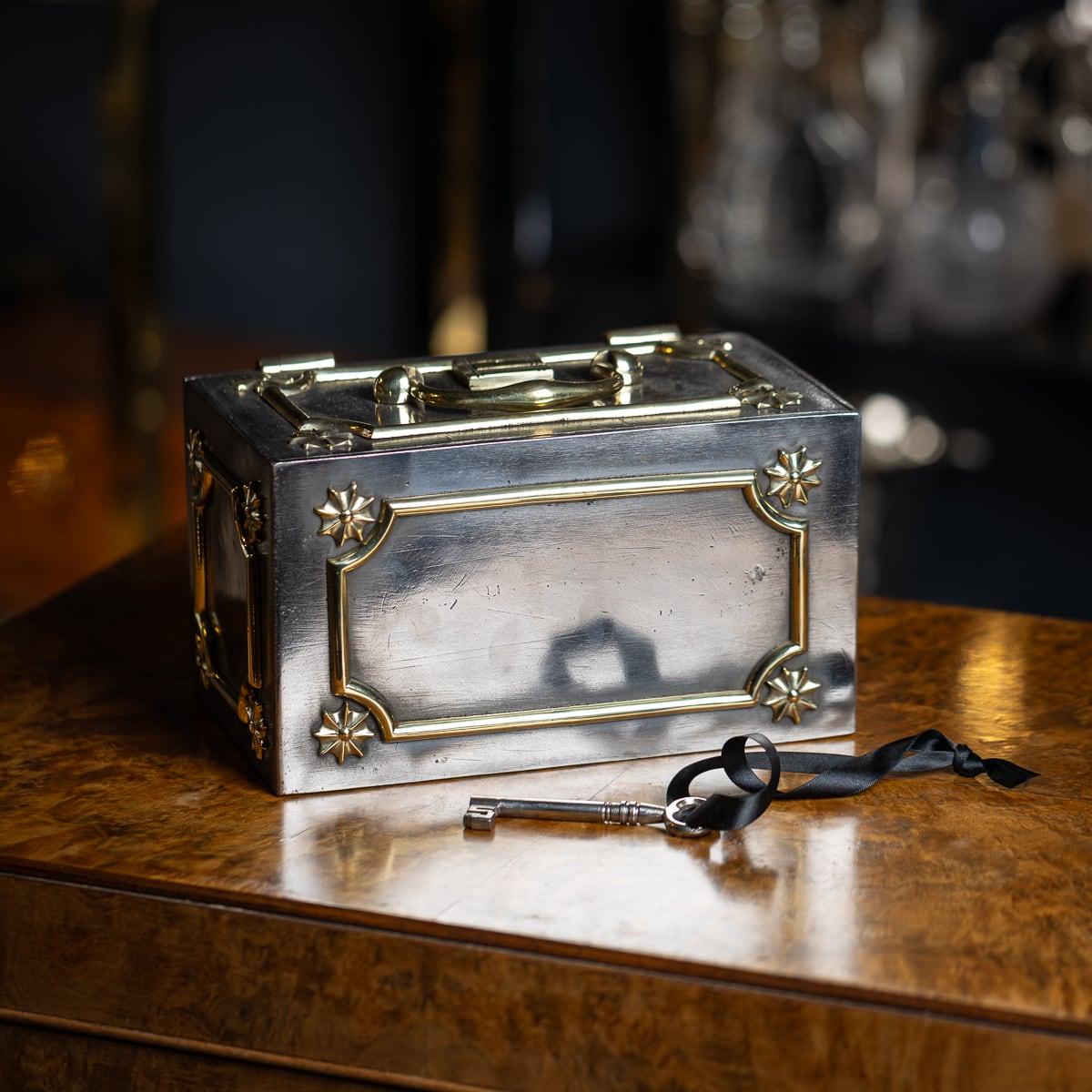 Antique 19th Century Victorian small cast iron strongbox safe with brass decorative detailing. Primarily used for the transport of document or valuables this was one of the first fireproof safes available. It would have been taken on long travels,