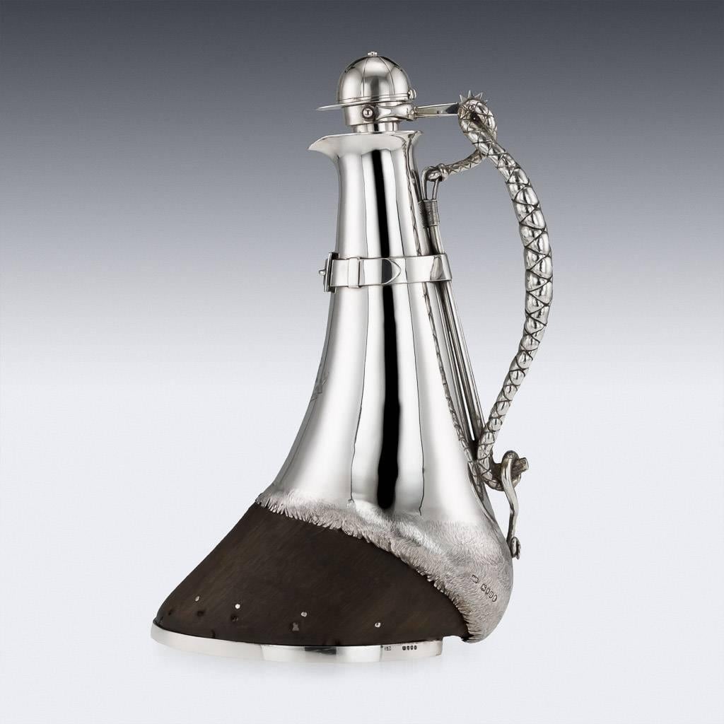 Antique 19th century Victorian very unusual and unique novelty solid silver mounted horse shoe decanter, the horses hoof silver mounted with a decanter, applied with a strap and buckle, with handle shaped as a jockeys crop, mounted with a spur hinge