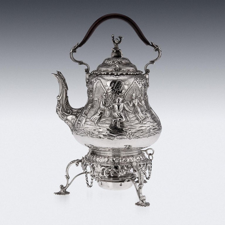 19th Century Victorian silver hot water kettle on stand, heavy and impressive, pear-form body chased with rustic scenes of peasants merry-making, in the style of the Dutch painter David Teniers. The lid mounted with a figural finial of a drunken