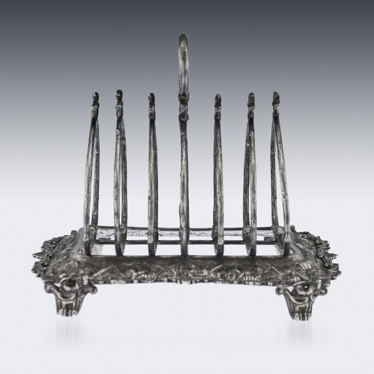 Description

Antique 19th century Victorian extremely rare solid silver toast rack, made in the 'Teniers' style, (a renowned Dutch painter), the base of the stand decorated with rural scenes, standing on scroll feet mounted with peasants drinking,