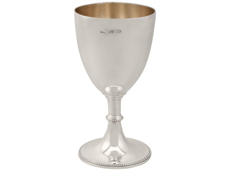 An exceptional, fine and impressive antique Victorian sterling silver goblet; an addition to our wine and drinks related silverware collection.

This exceptional antique Victorian sterling silver goblet has a circular bell shaped form onto a swept