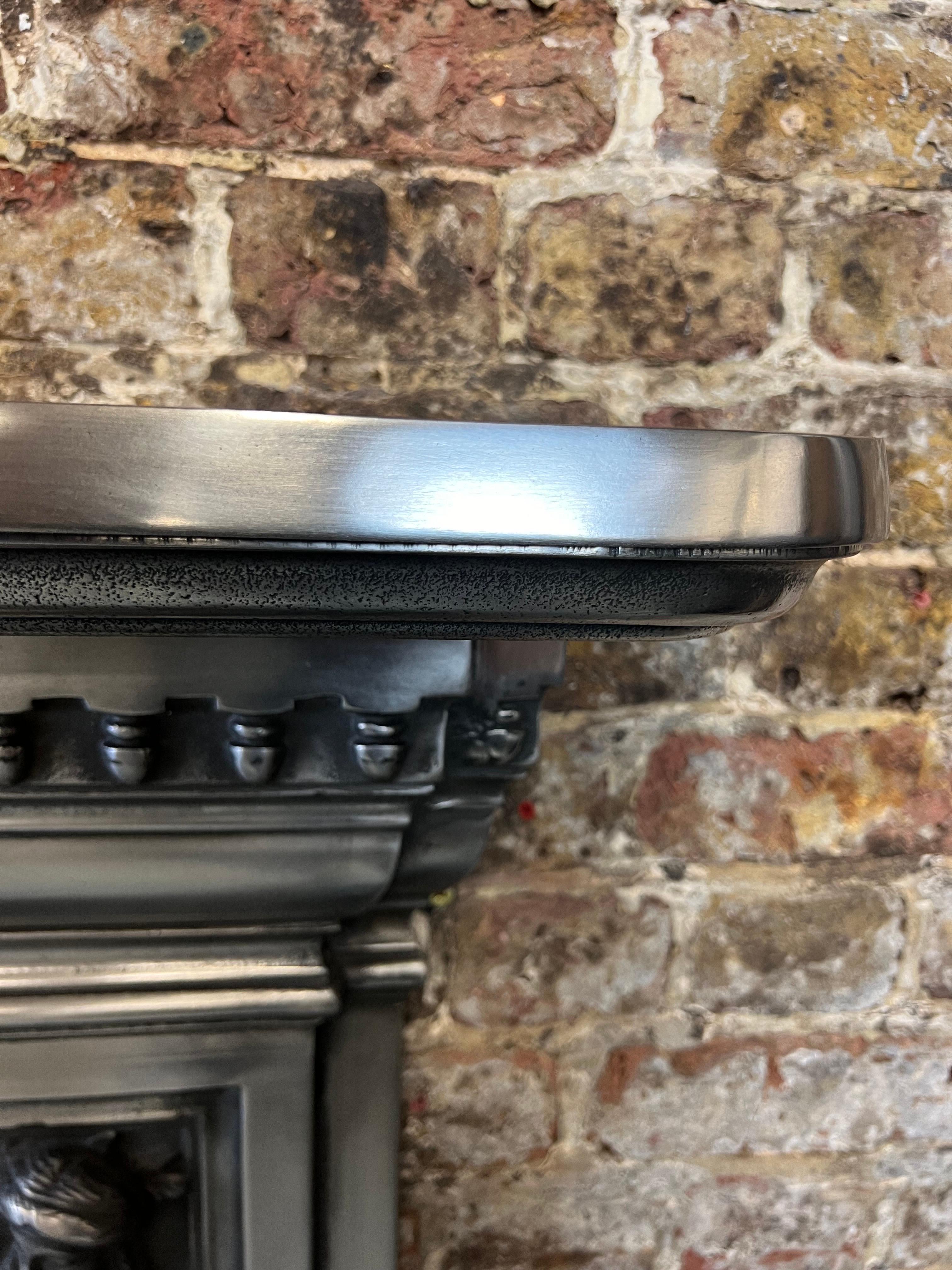 20th Century 19th Century Victorian Style Polished Cast Iron Fireplace Mantelpiece For Sale