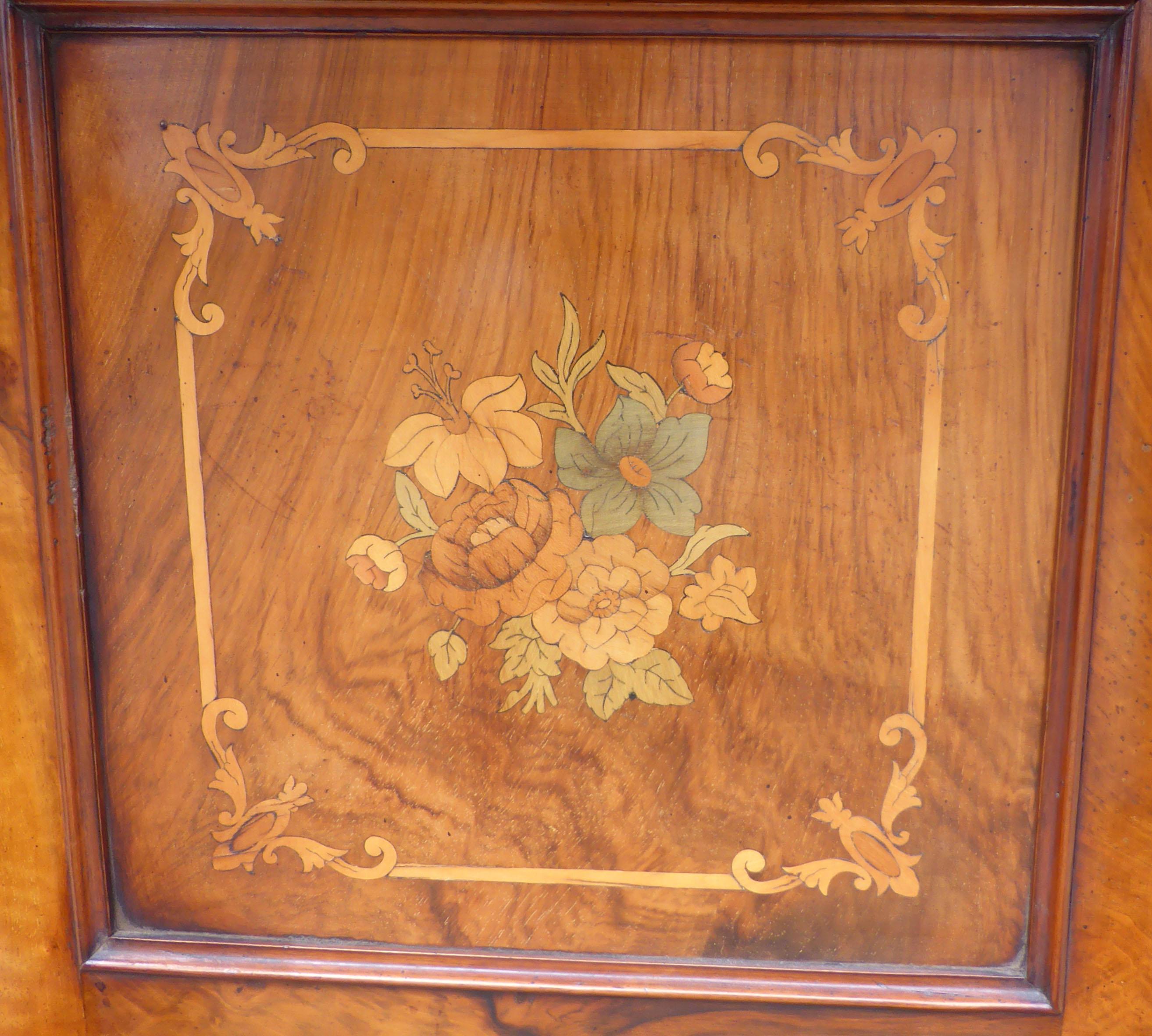 Fine marquetry walnut Davenport profusely inlaid with flowers. Early Victorian, circa 1850 with Wellington chest side lockers on the drawers. The top of the davenport has a very nice fretted wooden gallery. The rising fall has inlaid flowers